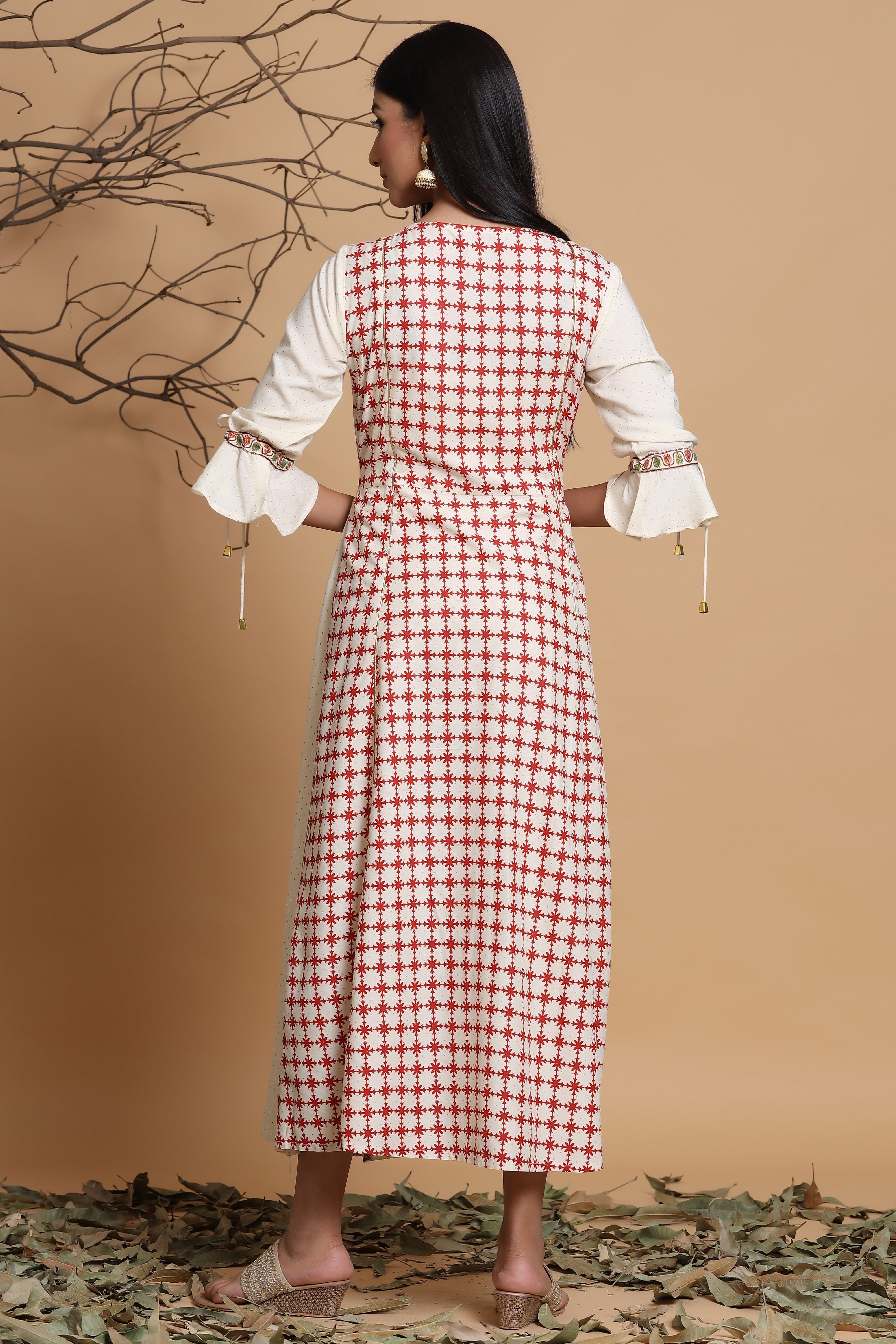 Juniper Ivory Ethnic Motif Printed Rayon Dress & Dori Tie-Up With Tassels On Sleeves