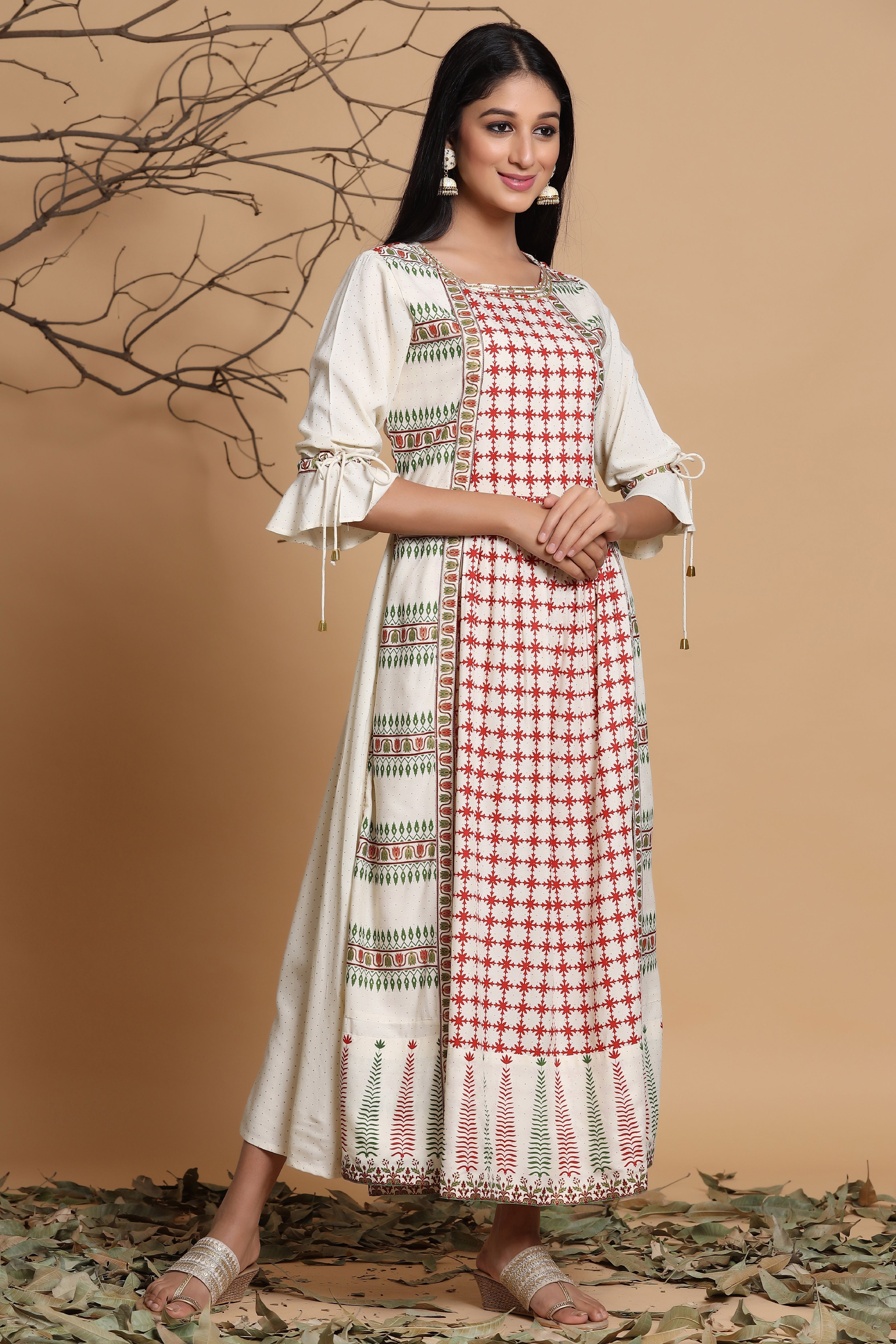 Juniper Ivory Ethnic Motif Printed Rayon Dress & Dori Tie-Up With Tassels On Sleeves