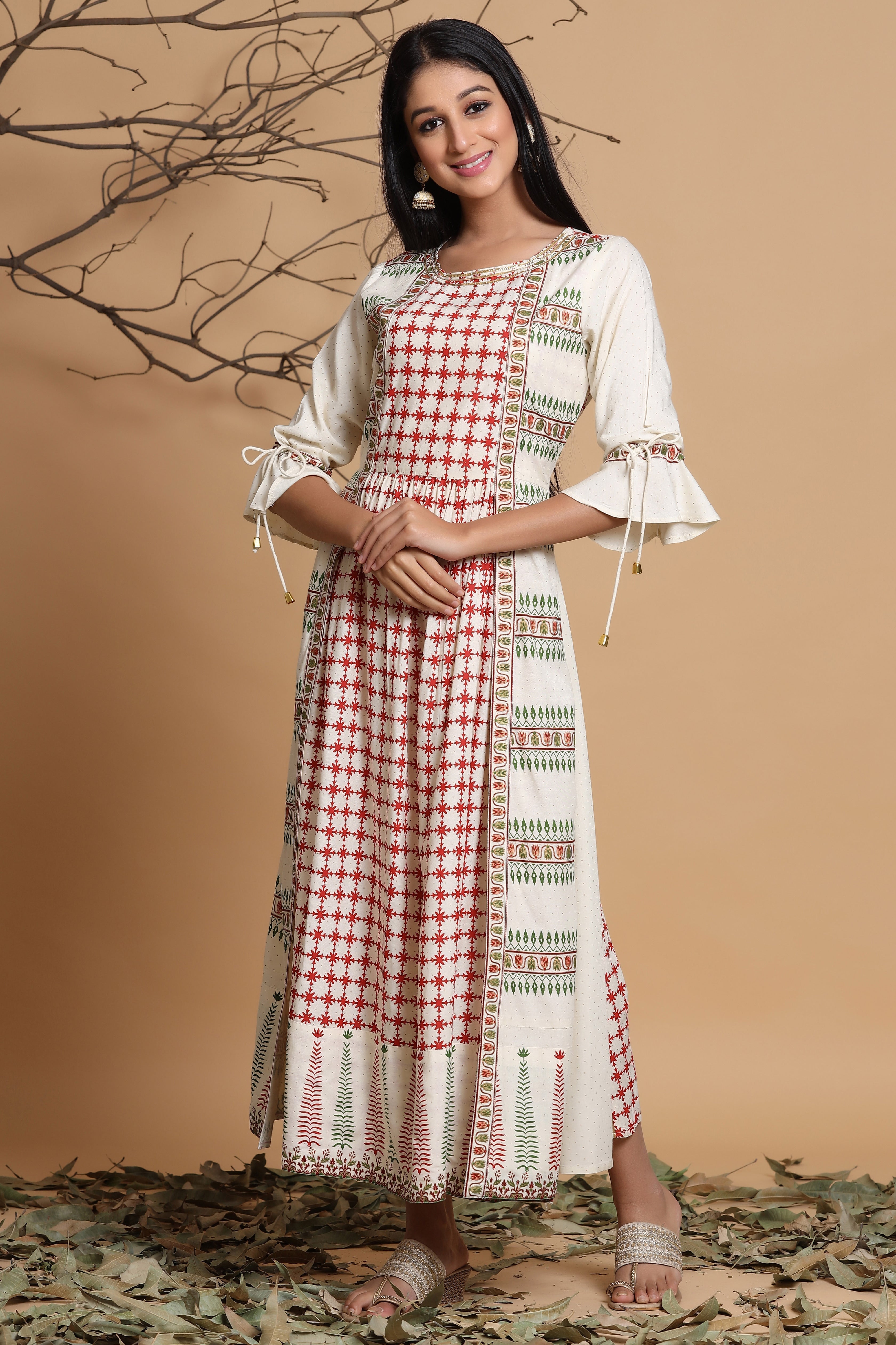 Juniper Ivory Ethnic Motif Printed Rayon Dress & Dori Tie-Up With Tassels On Sleeves