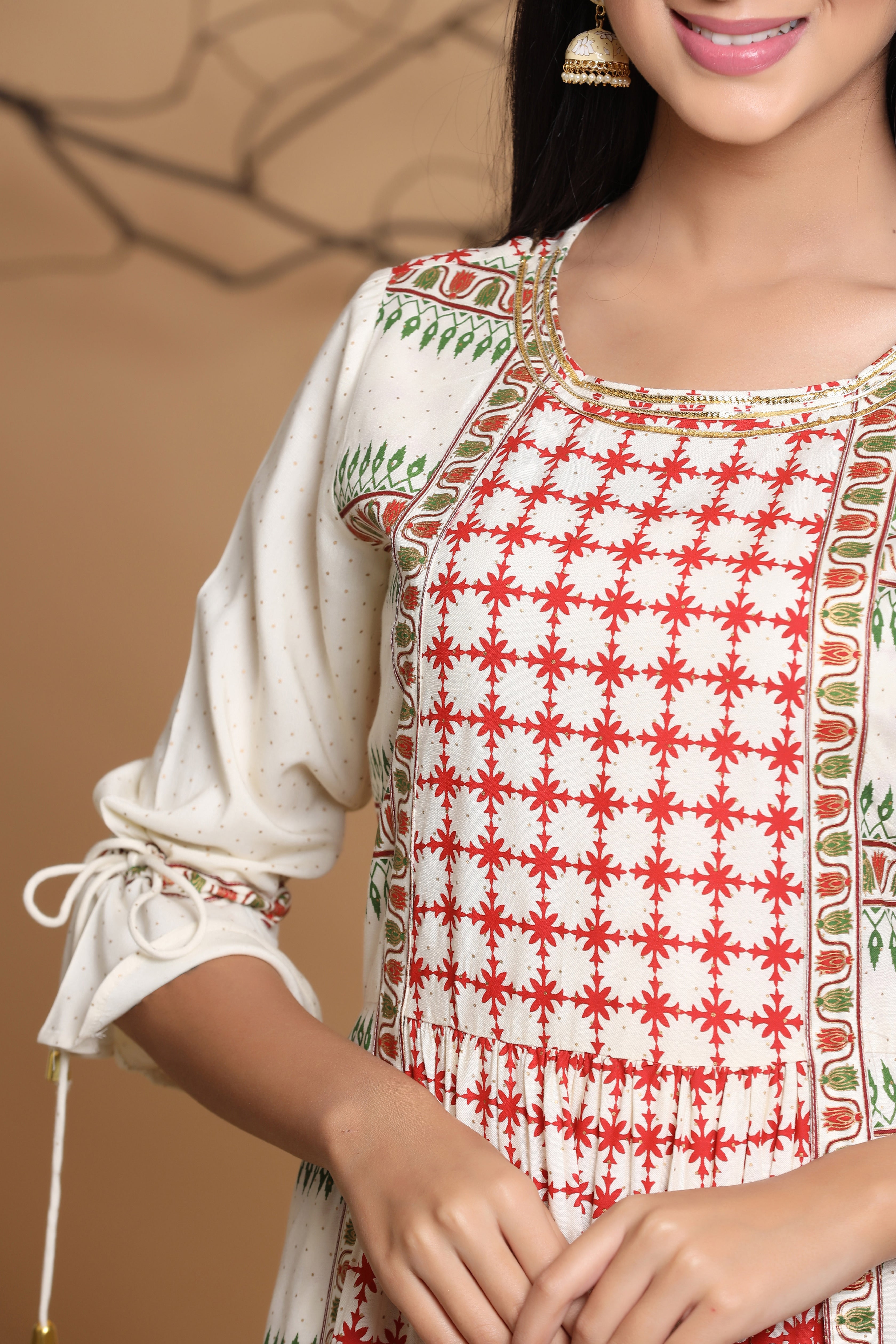 Juniper Ivory Ethnic Motif Printed Rayon Dress & Dori Tie-Up With Tassels On Sleeves