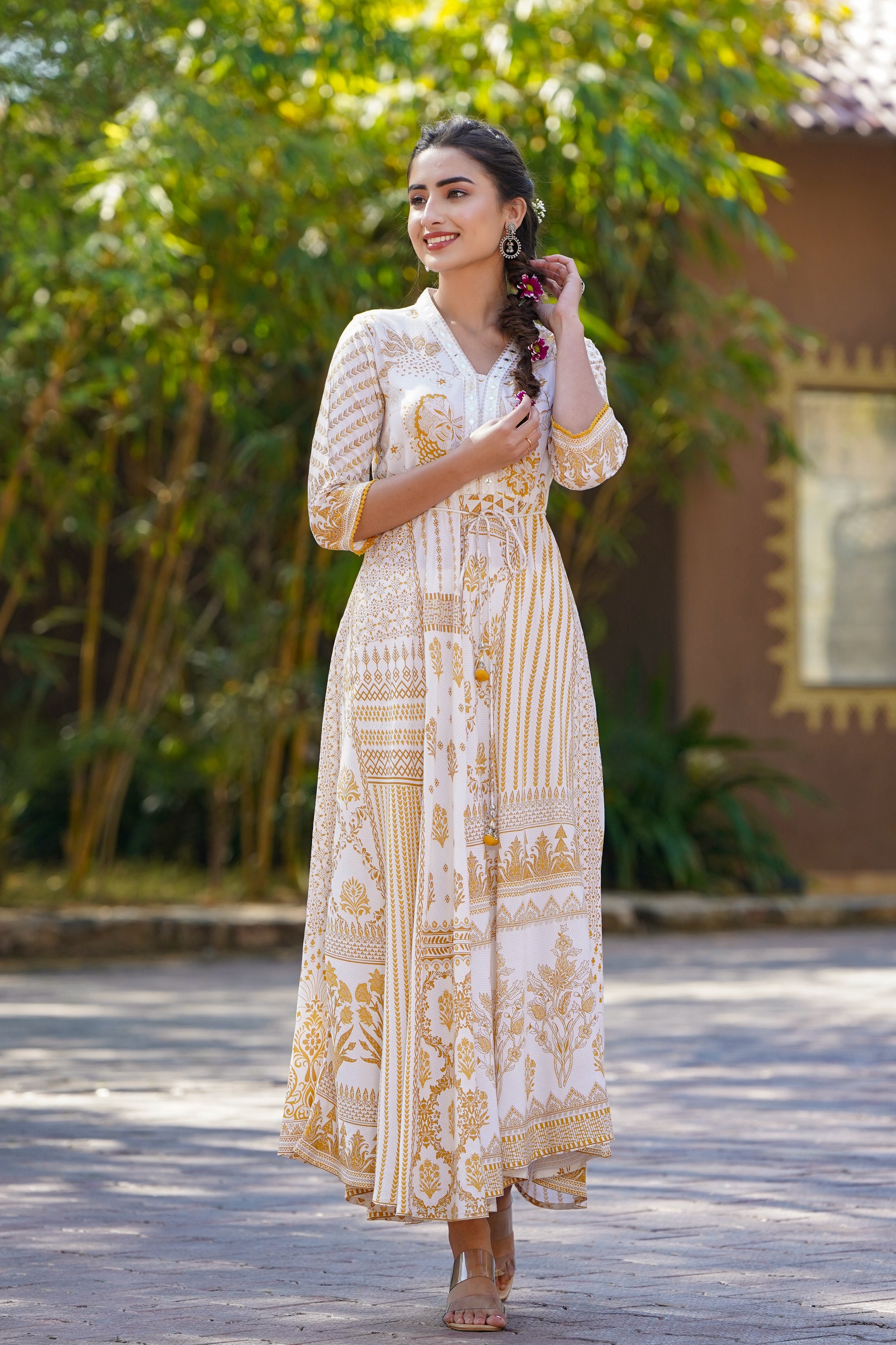 Juniper Mustard Printed Rayon Lacy Maxi Dress With Mirror Embroidered Neckline & Tassels At Waist
