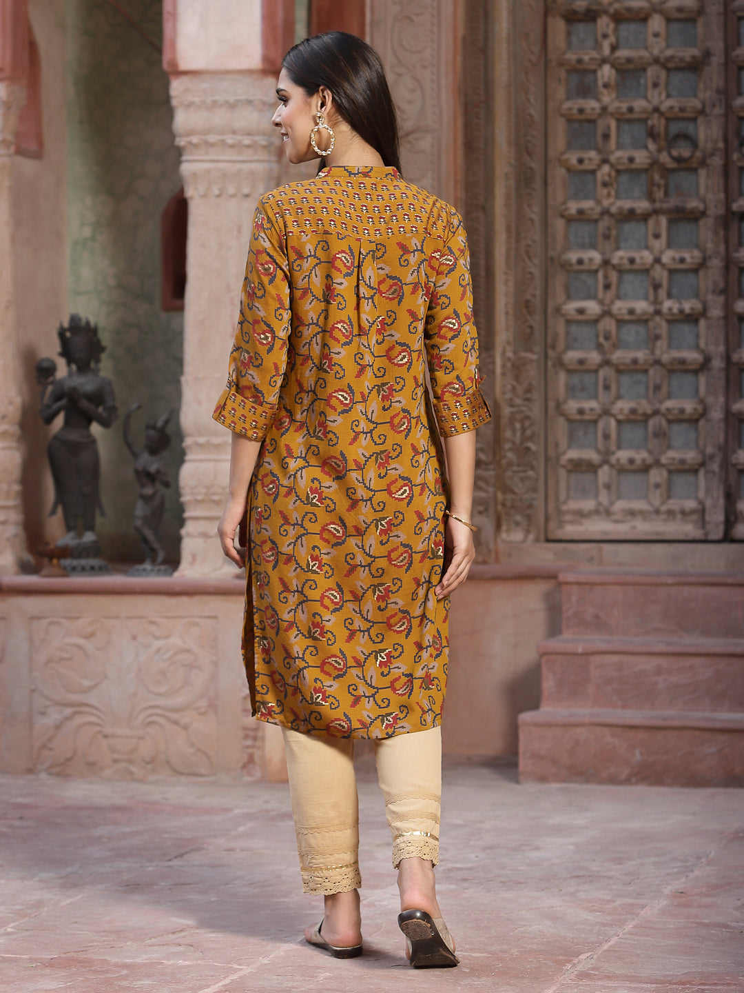 Juniper Mustard Floral Printed Muslin Kurta With Tassels & A Pleat At Front