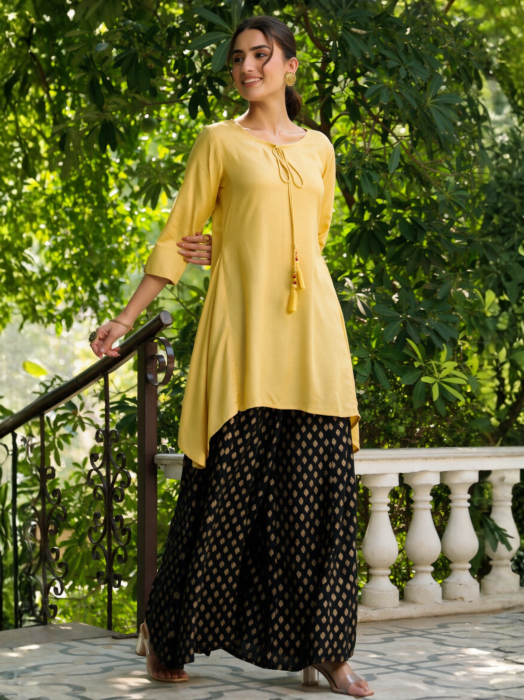 Yellow Solid Rayon Slub Asymmetric Women Kurta With Tie-ups