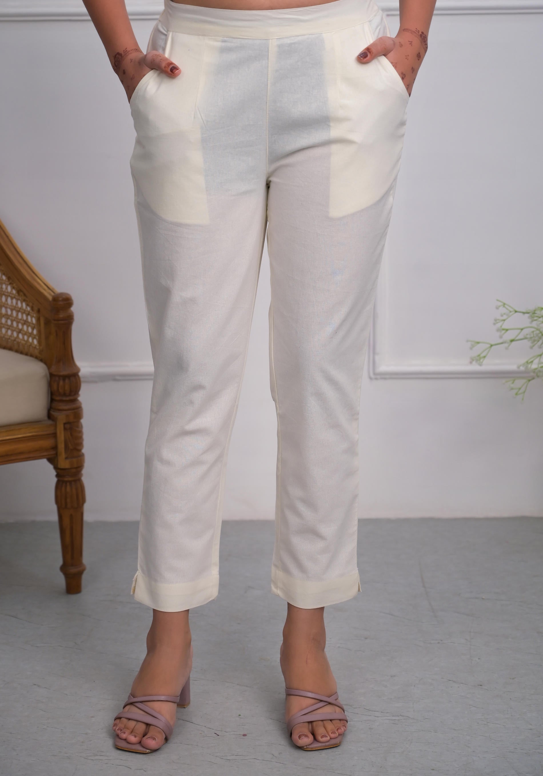 Off White Solid Cotton Pants With Partially Elasticated Waistband And Two Side Pockets