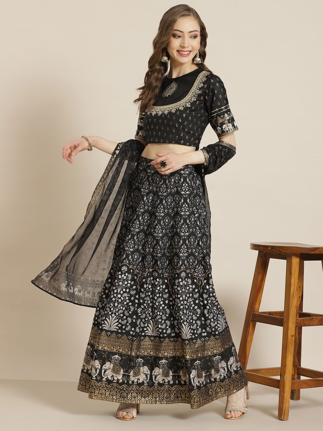 Juniper Black Ethnic motif Printed Shantoon Lehenga Choli & Dupatta Set With Zari Work Embroidery.