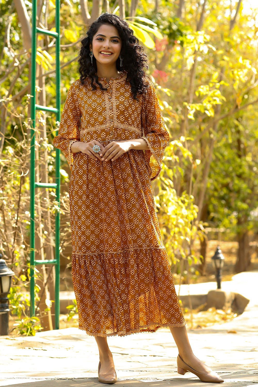 Juniper Brown Ethnic Motif Printed Georgette Maxi dress with Lace Work