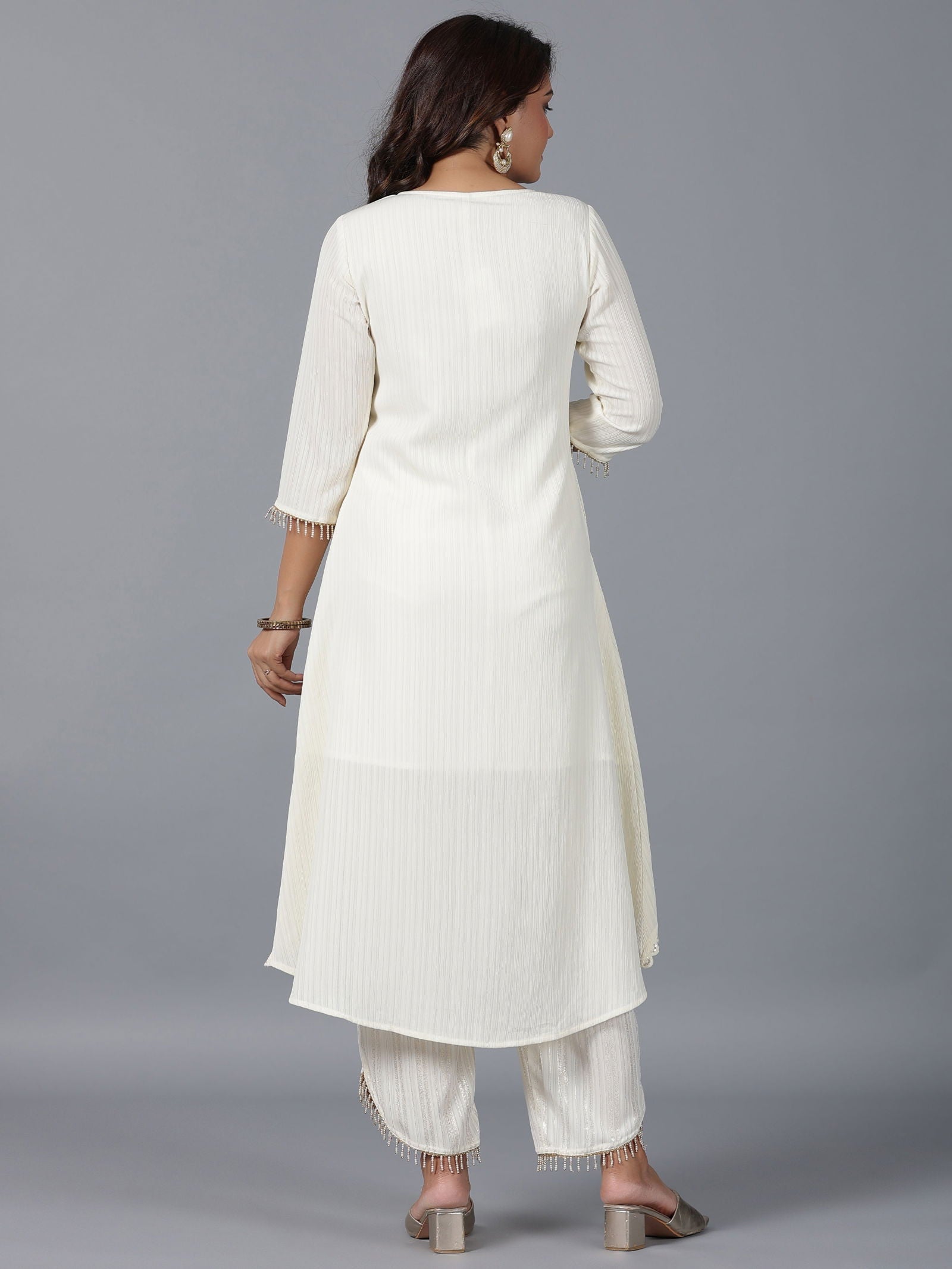 Juniper Ivory Magnus Embellished High-Low Kurta and Pants Set.