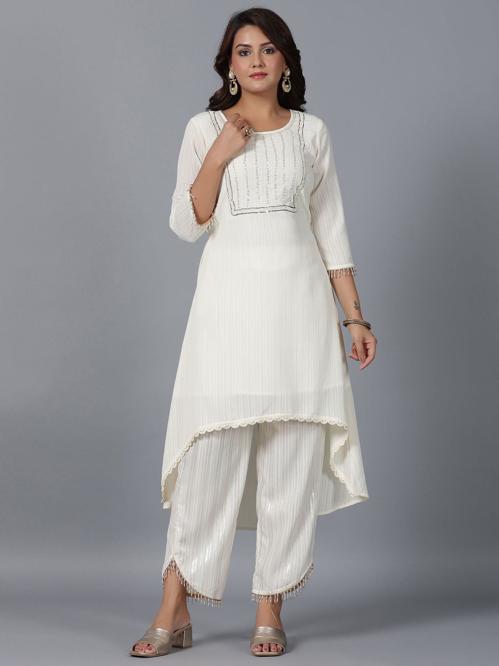 Juniper Ivory Magnus Embellished High-Low Kurta and Pants Set.