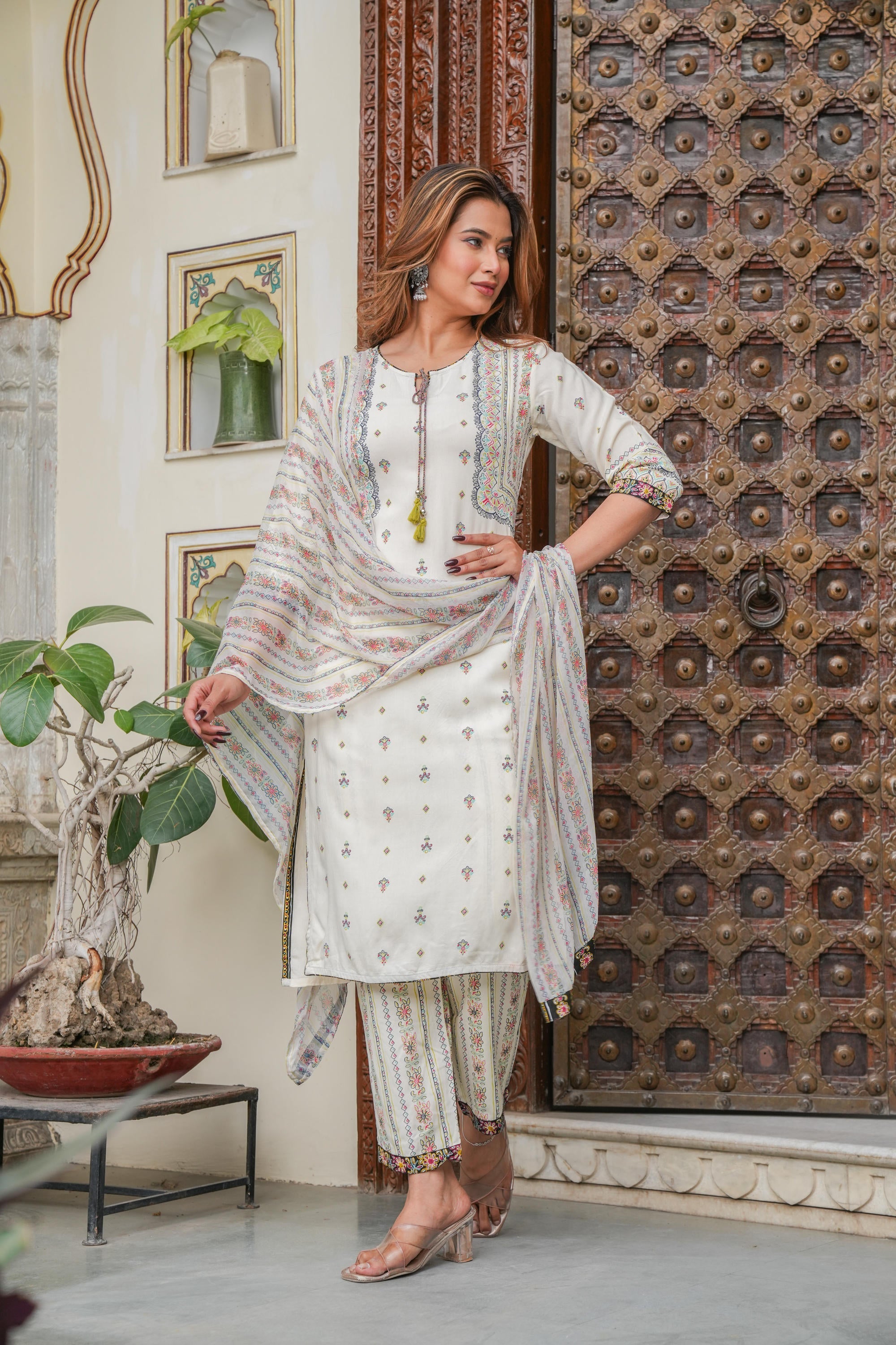 Off white printed kurta , Printed bottom and floral dupatta with dori and tassel