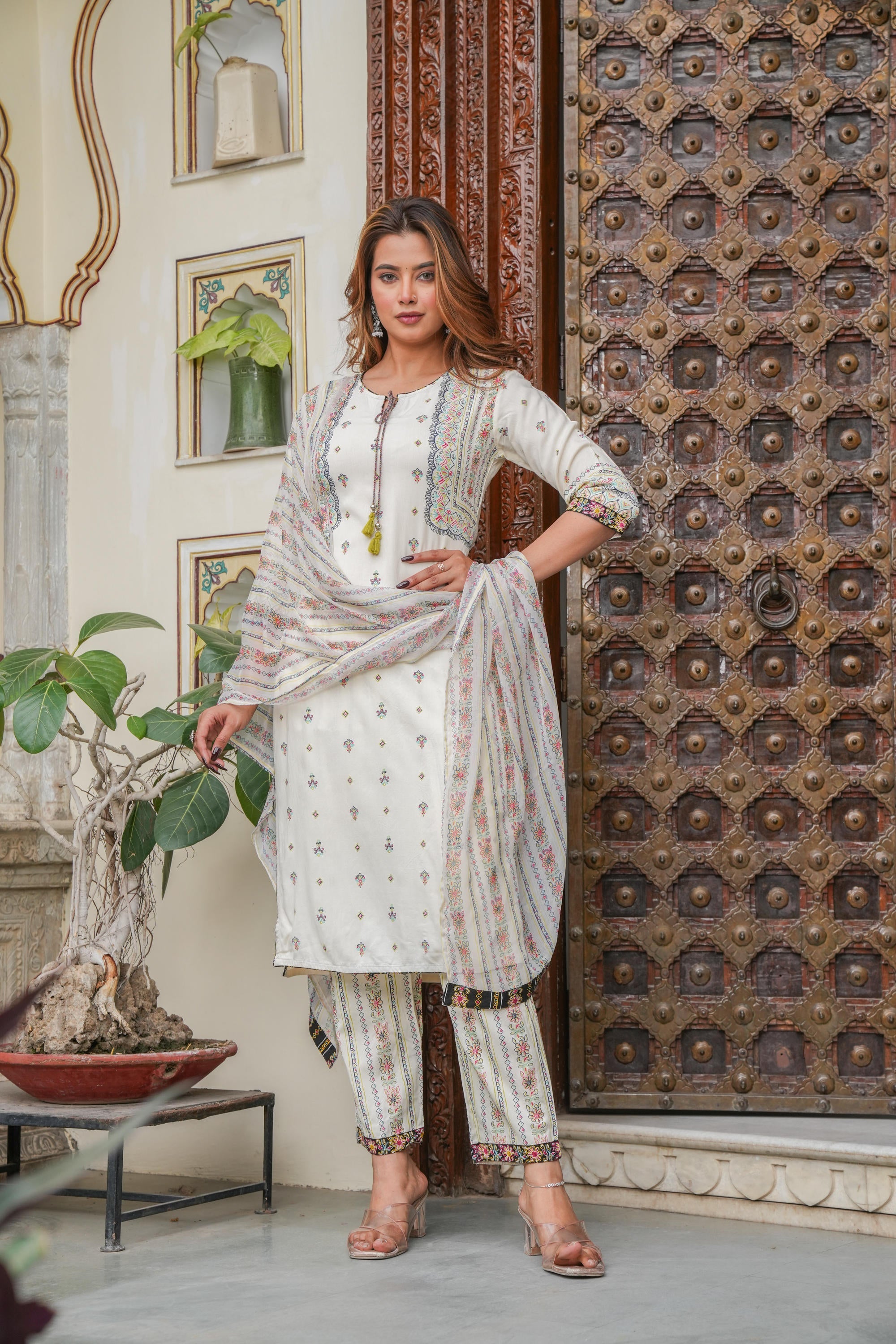 Off white printed kurta , Printed bottom and floral dupatta with dori and tassel