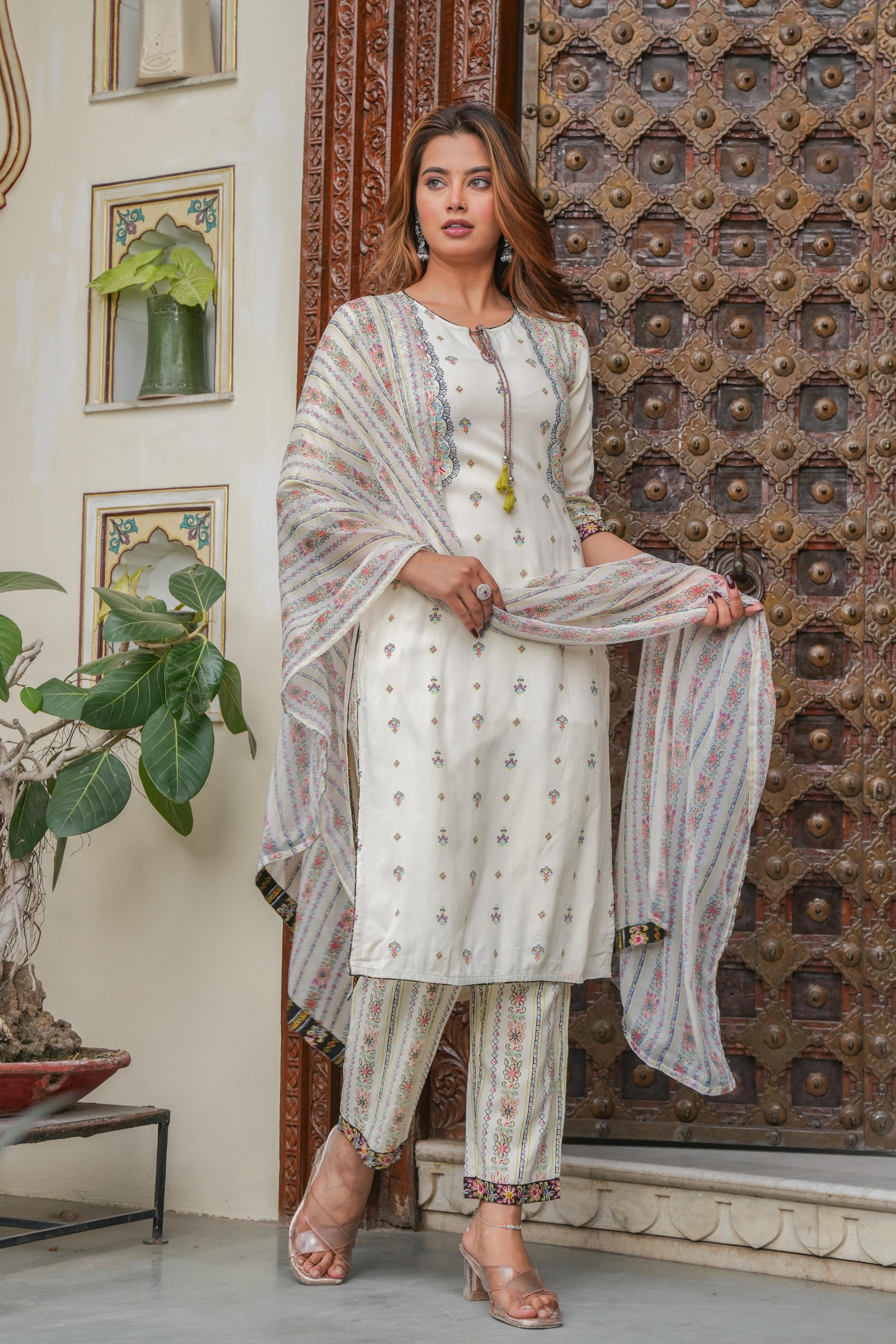 Off white printed kurta , Printed bottom and floral dupatta with dori and tassel