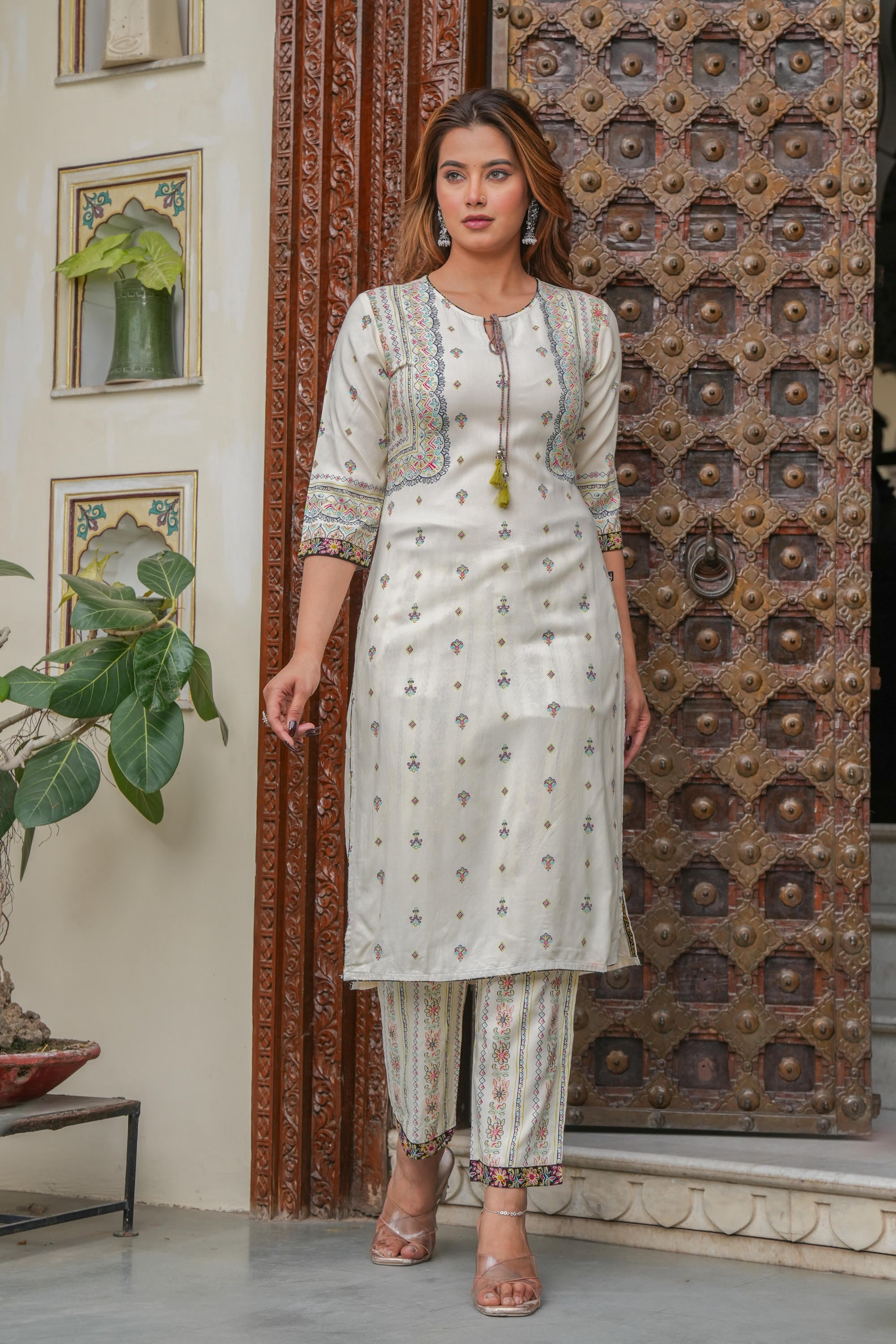 Off white printed kurta , Printed bottom and floral dupatta with dori and tassel
