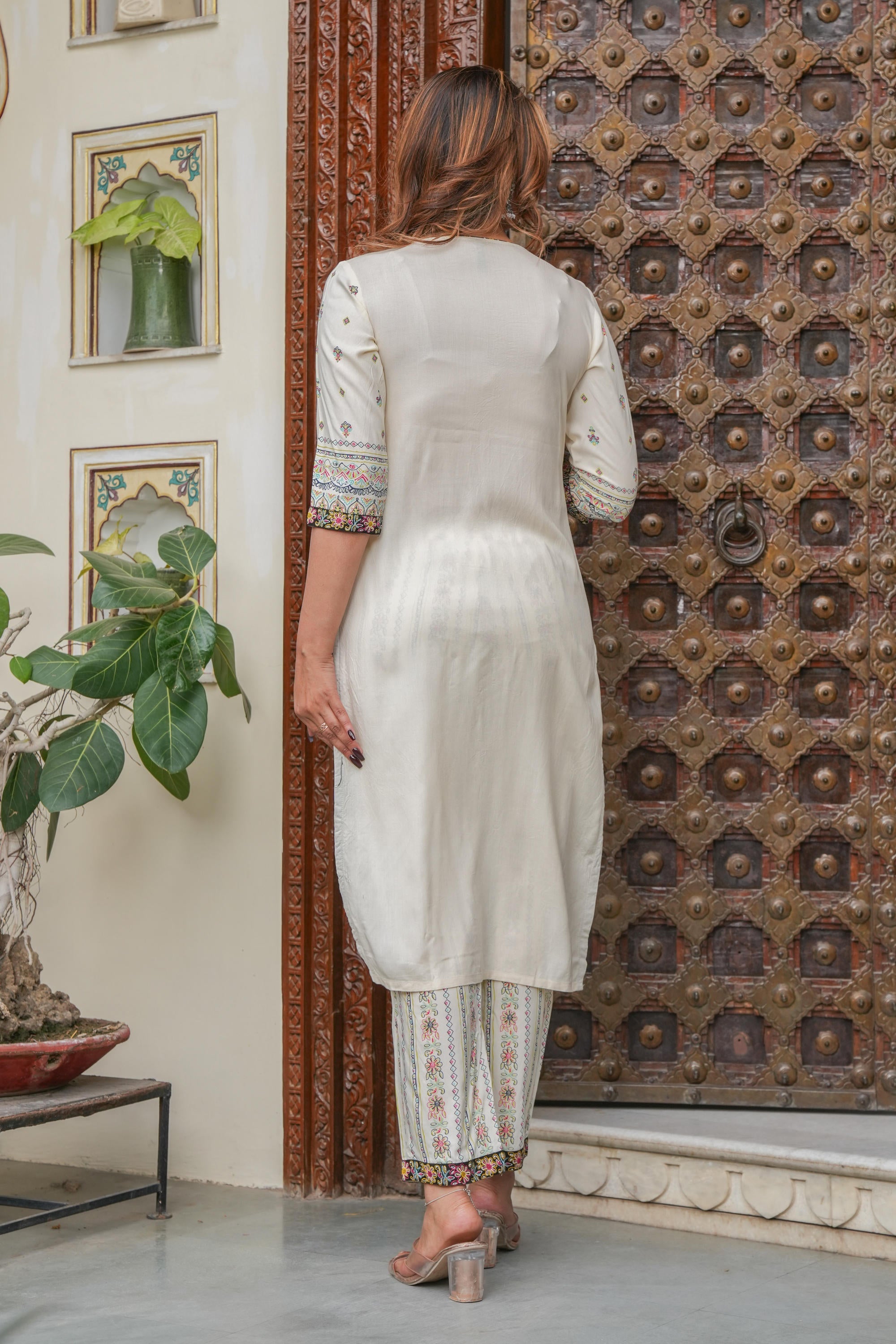 Off white printed kurta , Printed bottom and floral dupatta with dori and tassel
