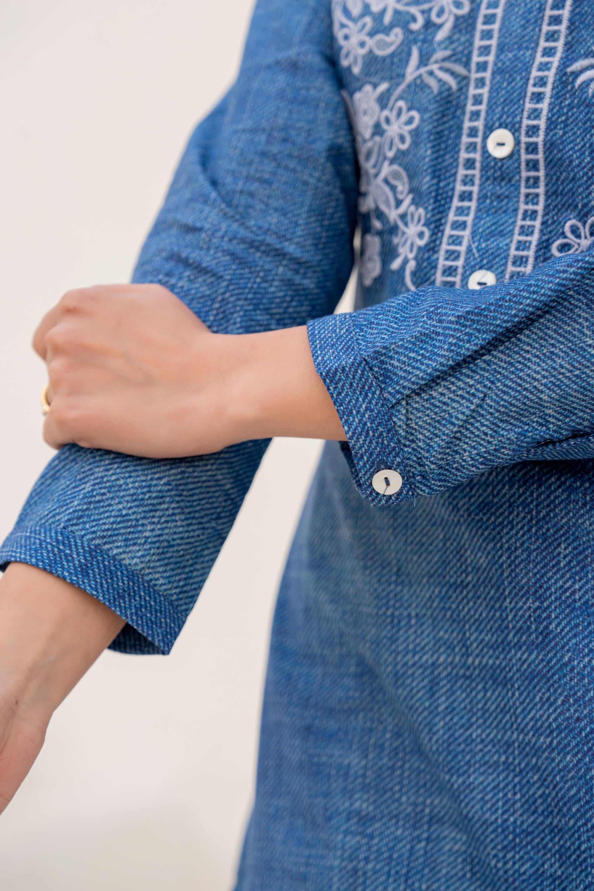 Blue solid cotton tunic with thread work and buttons,