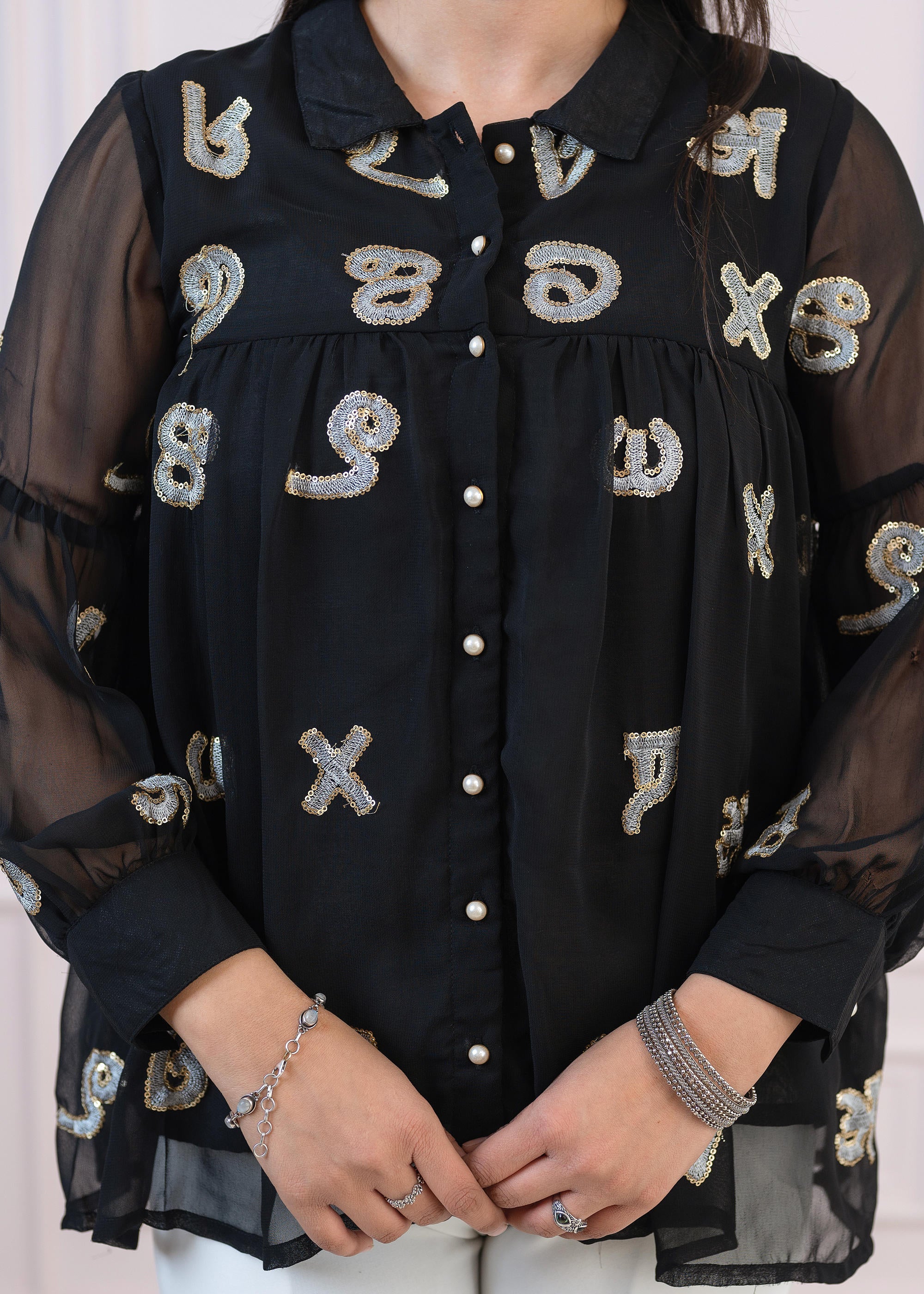 Black embroiderd and sequince tunic with buttons