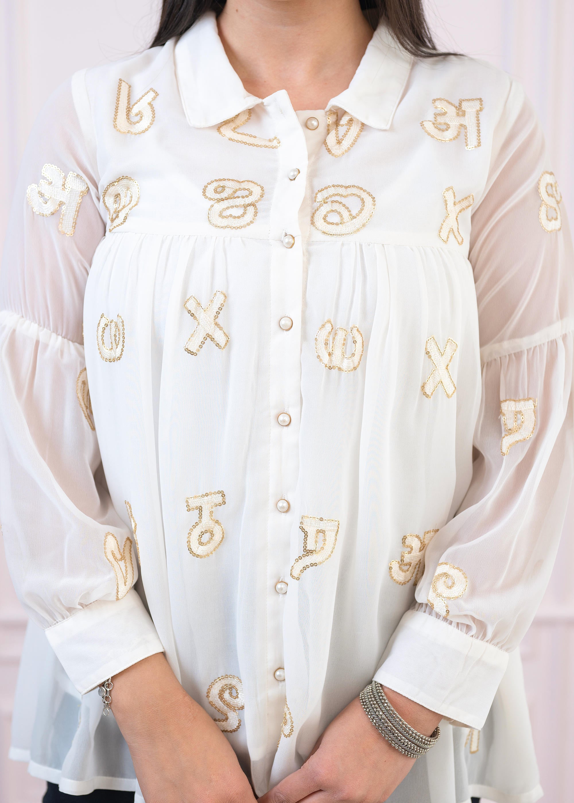 White embroiderd and sequince tunic with buttons