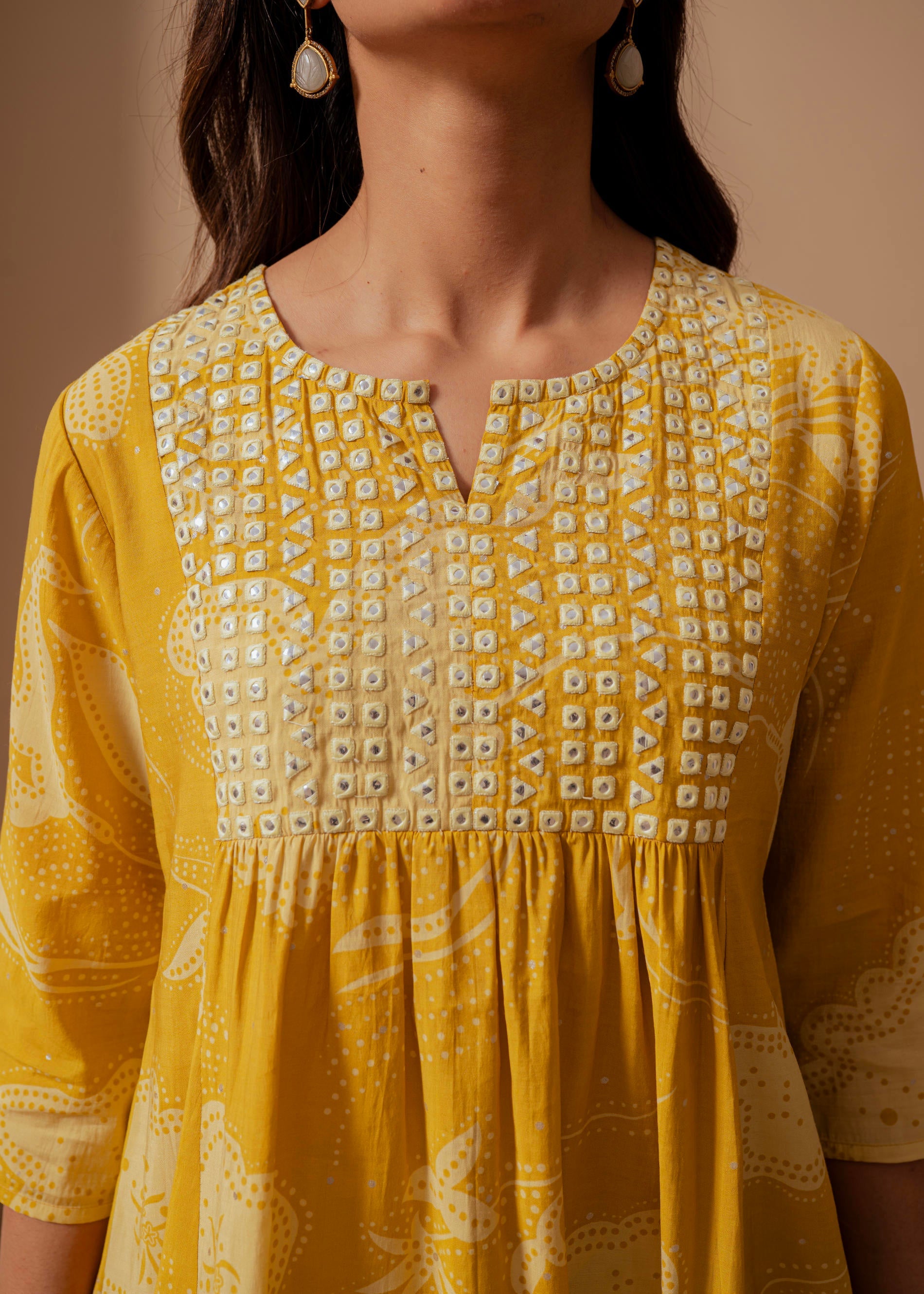 Mustard Ethnic Motifs Viscose Tunic with Thread Work and Mirror Detailing