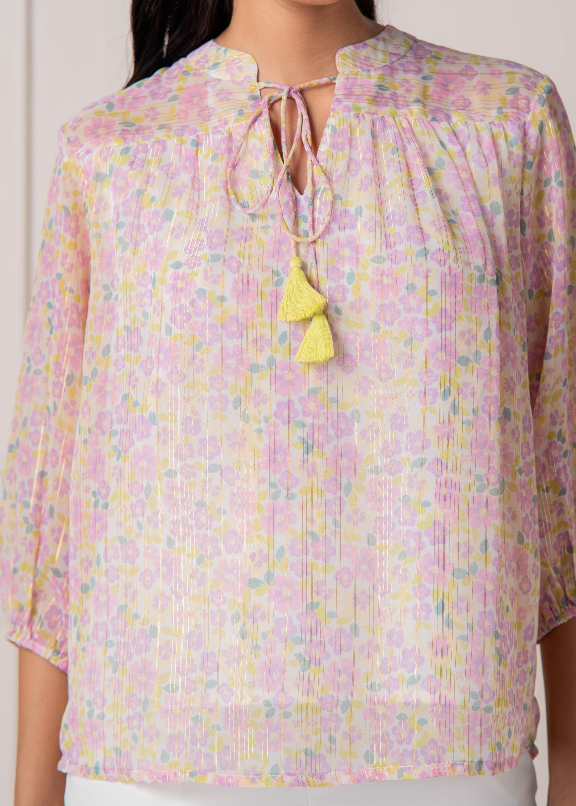 Lamora Pastel Floral Tie-Neck Peasant Top with Tassels