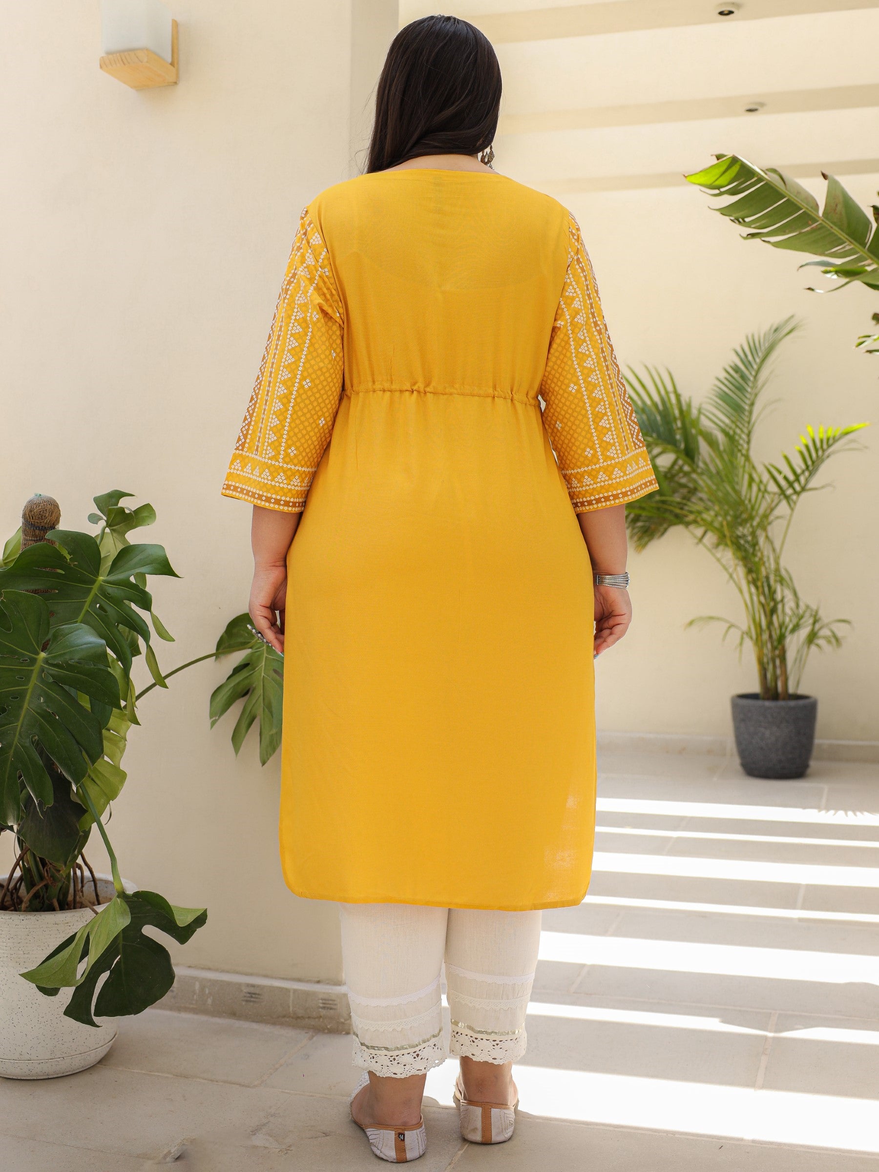 The Madhubala Women Mustard Geometric Printed Rayon Plus Size Kurta With Contrast Beadwork Sequins & Tassels