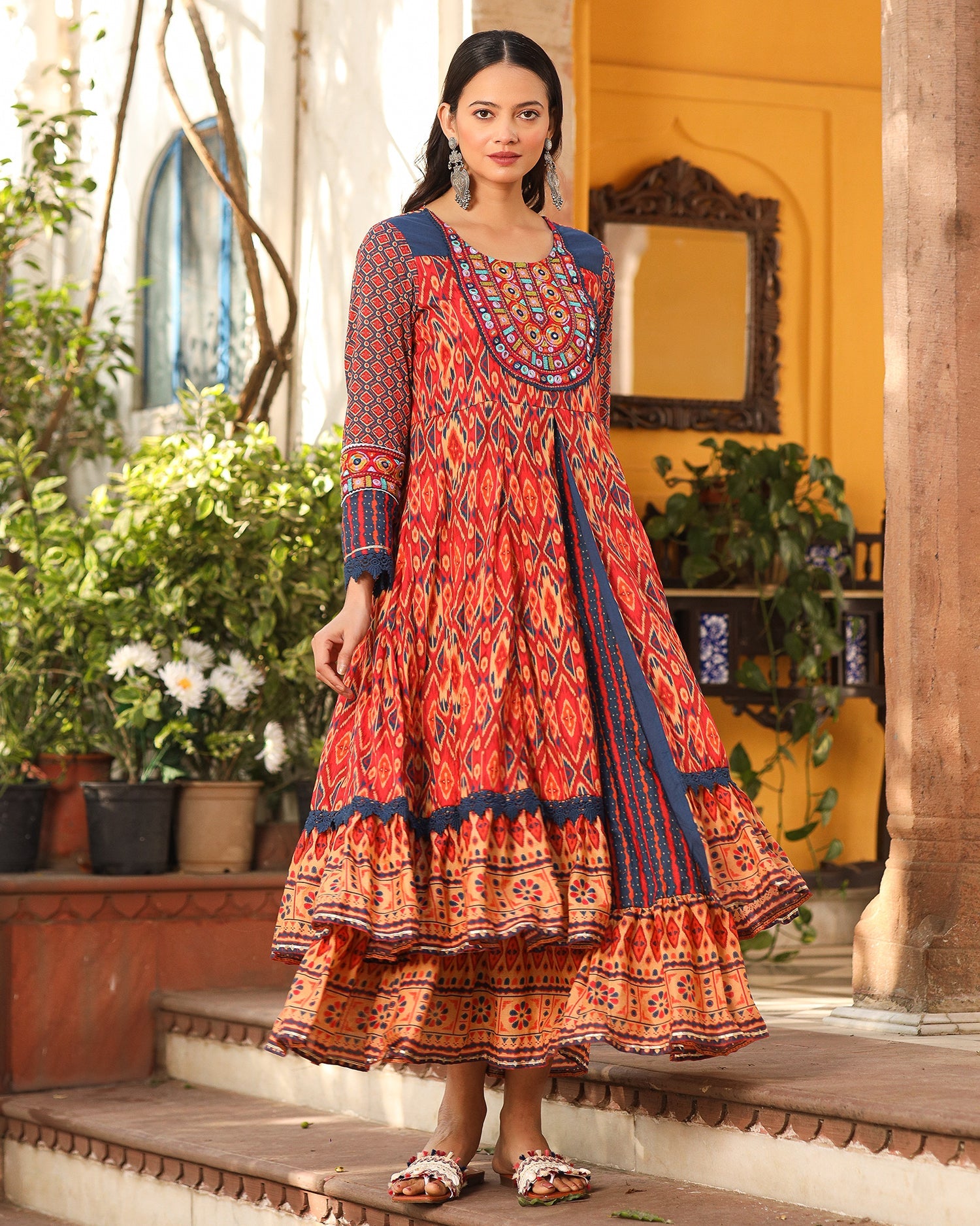 Juniper Rust Cotton Ikat Printed Layered Maxi Dress With Thread Embroidery & Dori Tassel Tie-Up At Waist