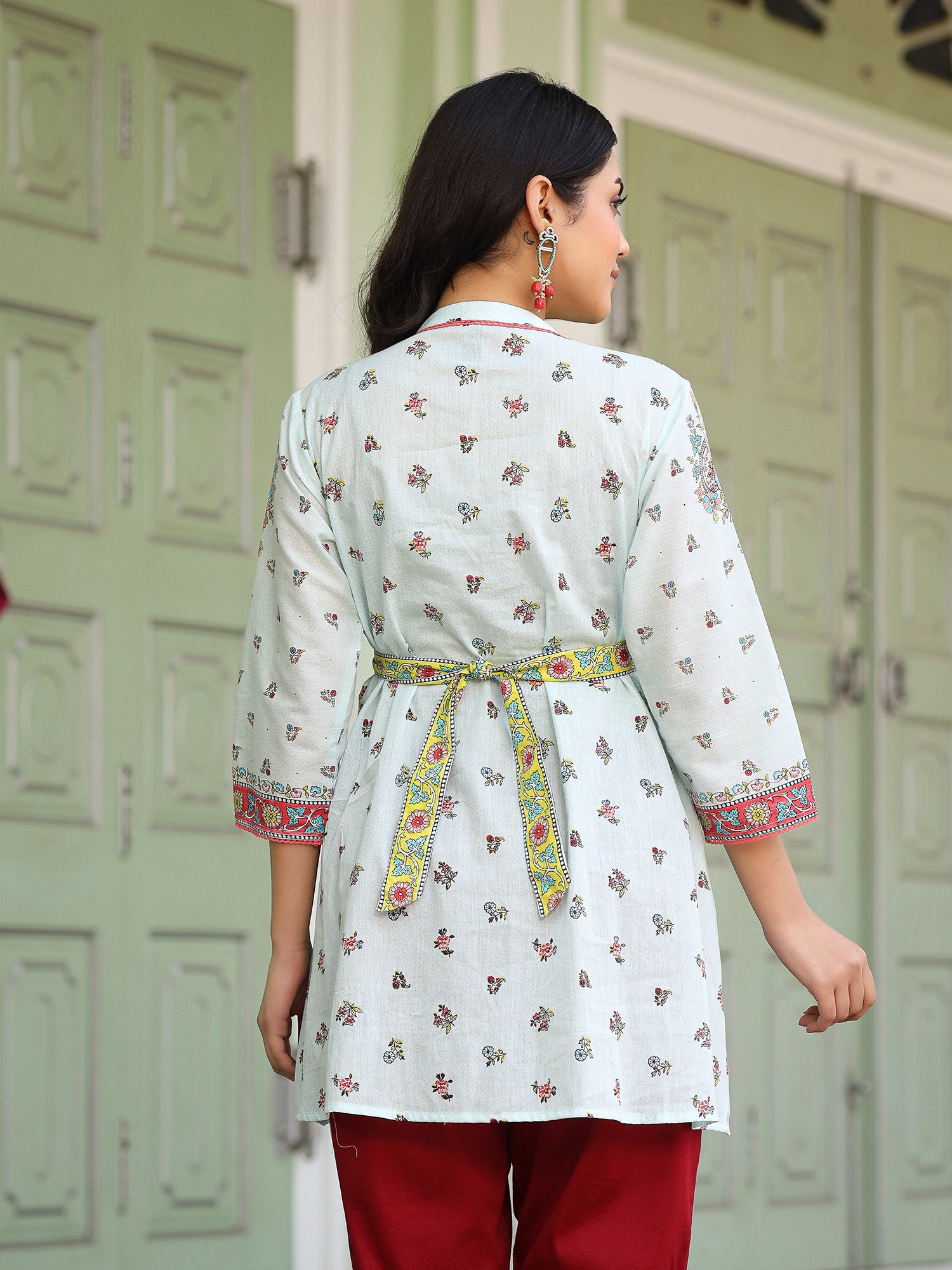 Juniper Women Sky Blue Cotton Floral Printed Lacy Peplum Tunic With Tie-Up At Back