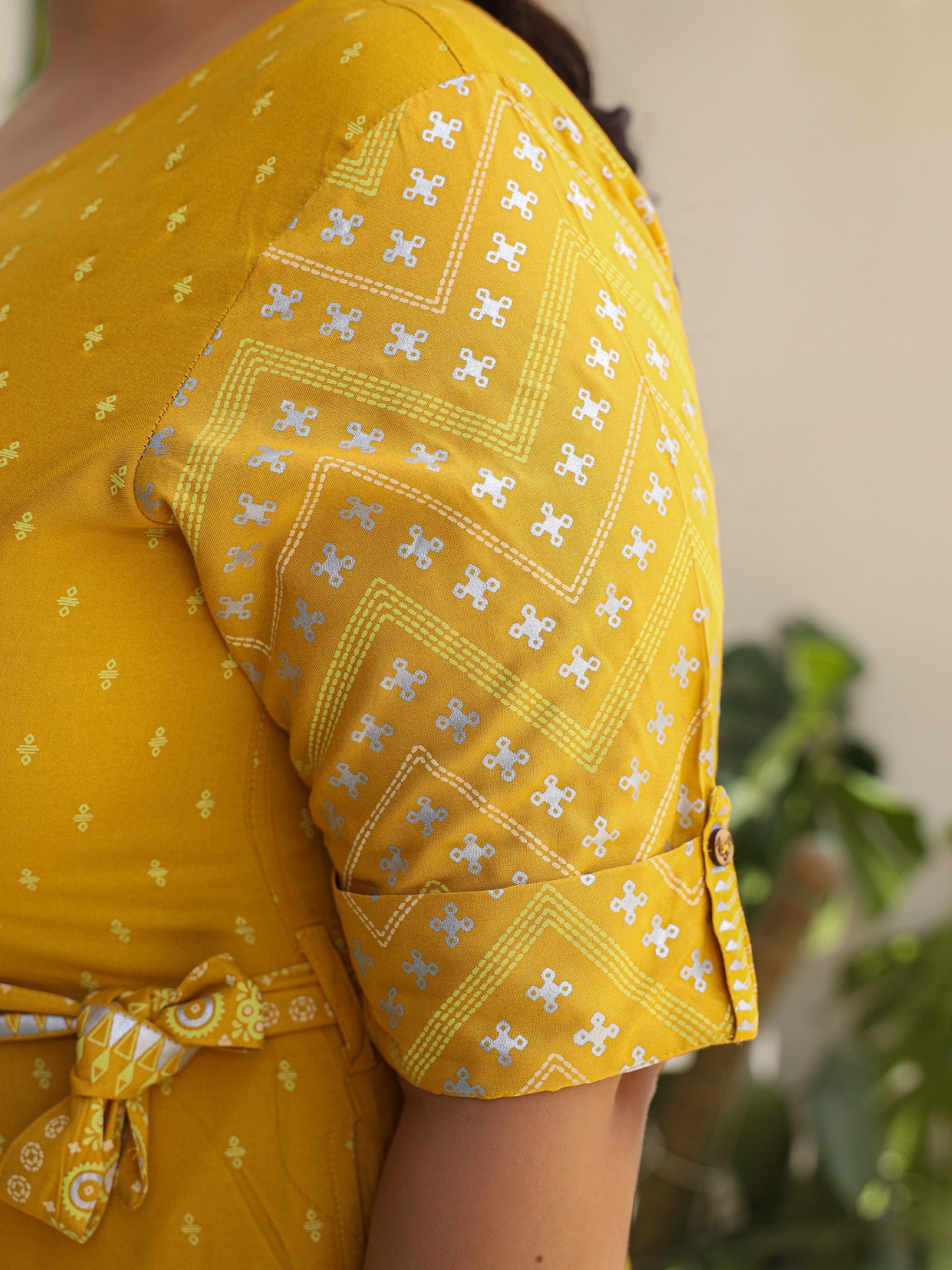 Juniper Mustard Ethnic Motif Printed Rayon Flex Jumpsuit.