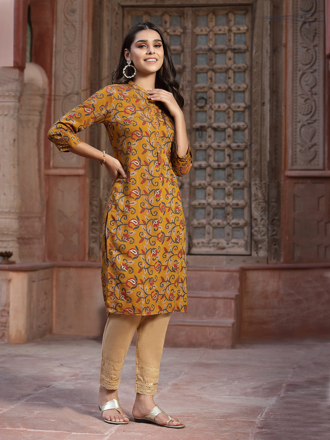 Juniper Mustard Floral Printed Muslin Kurta With Tassels & A Pleat At Front