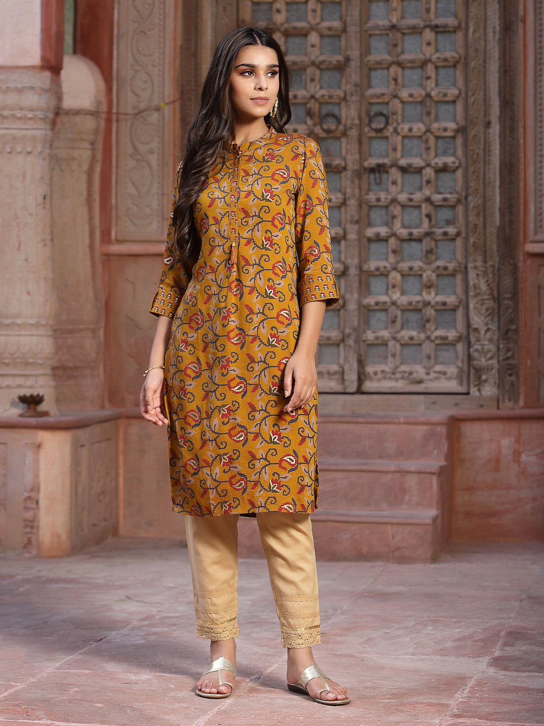 Juniper Mustard Floral Printed Muslin Kurta With Tassels & A Pleat At Front