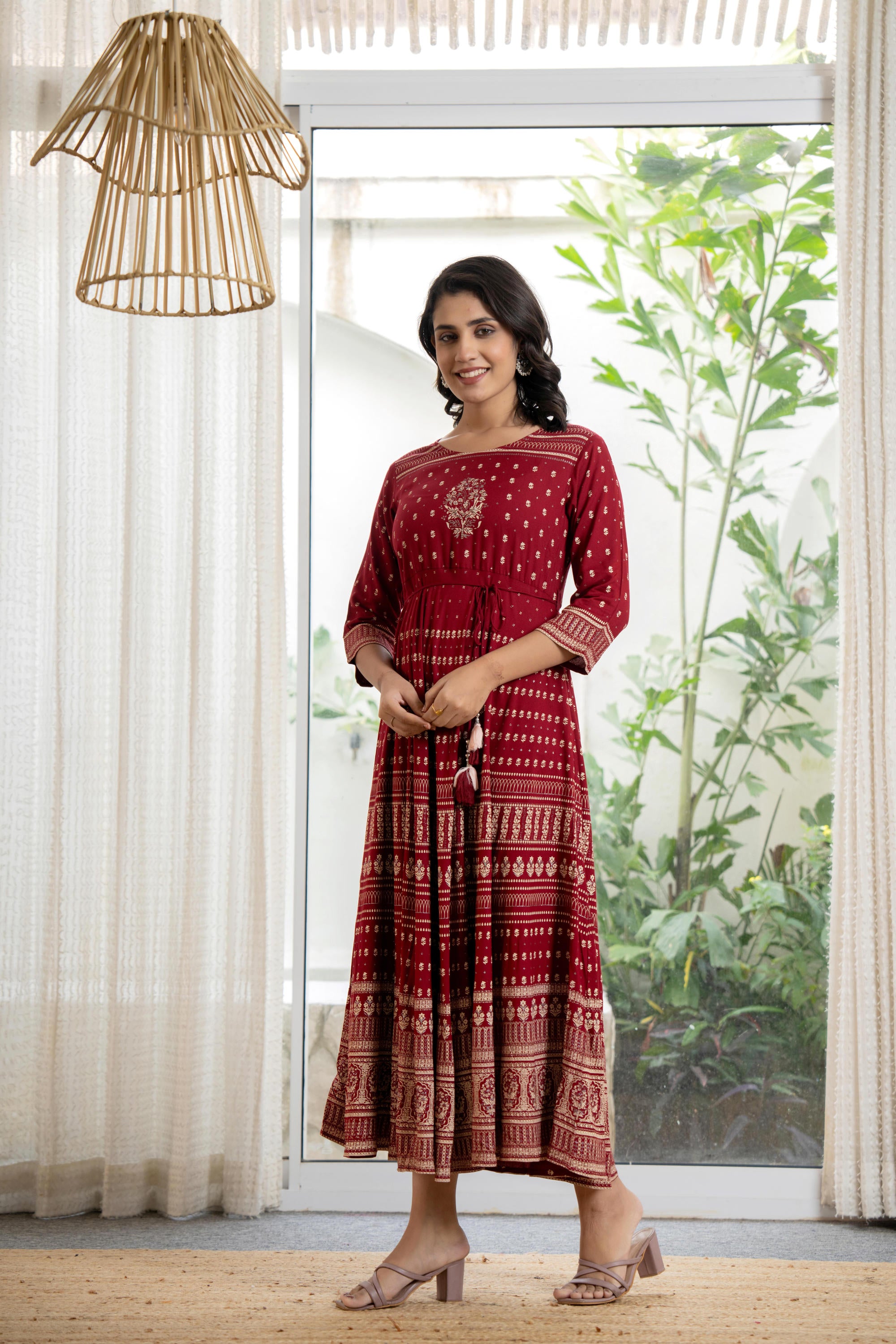 Maroon Ethnic Motif Printed Liva RayonDress With Sequins & Beads