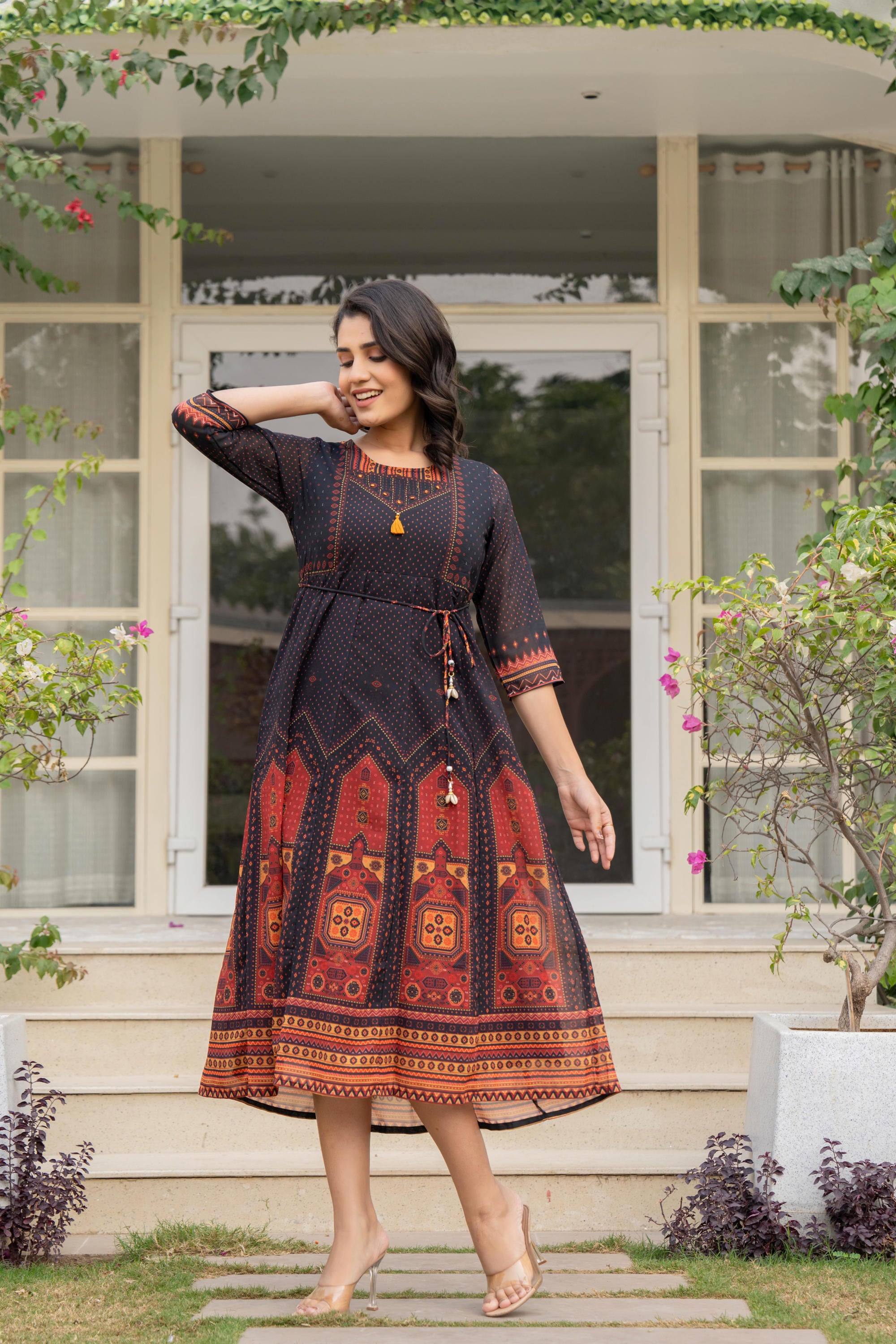 Black Ethnic Motif Printed Georgette Dress With Doris & Tassels