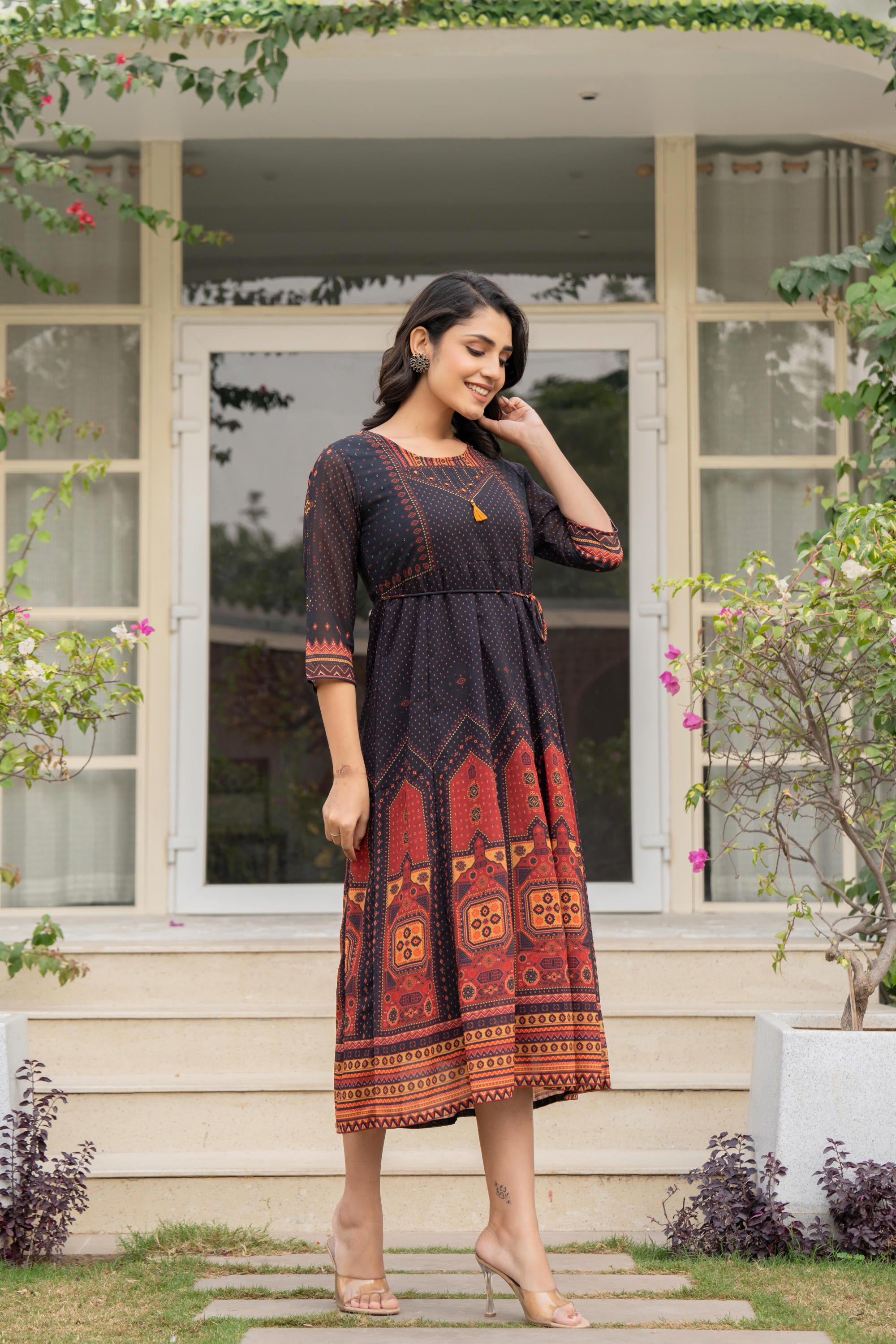 Black Ethnic Motif Printed Georgette Dress With Doris & Tassels