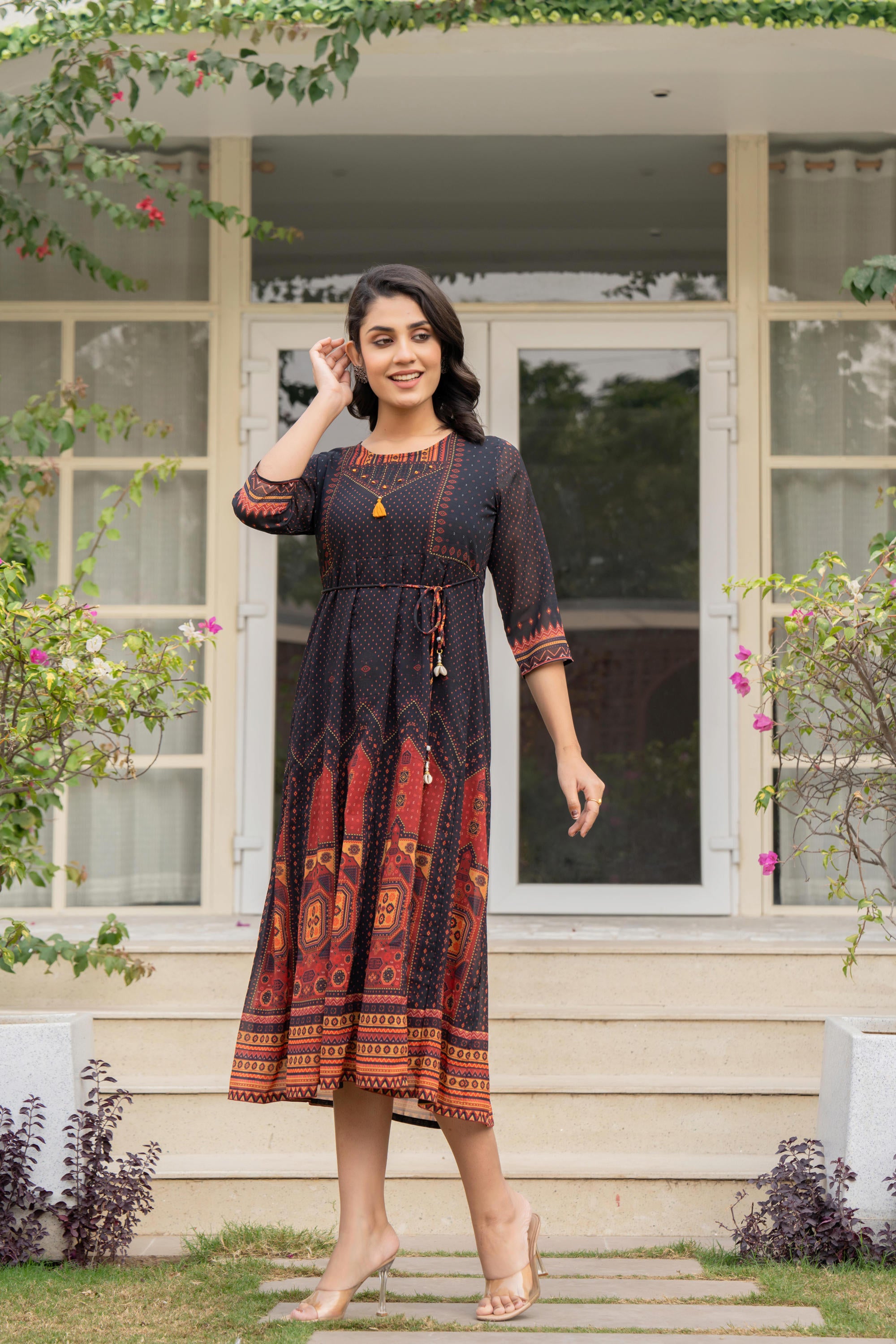 Black Ethnic Motif Printed Georgette Dress With Doris & Tassels