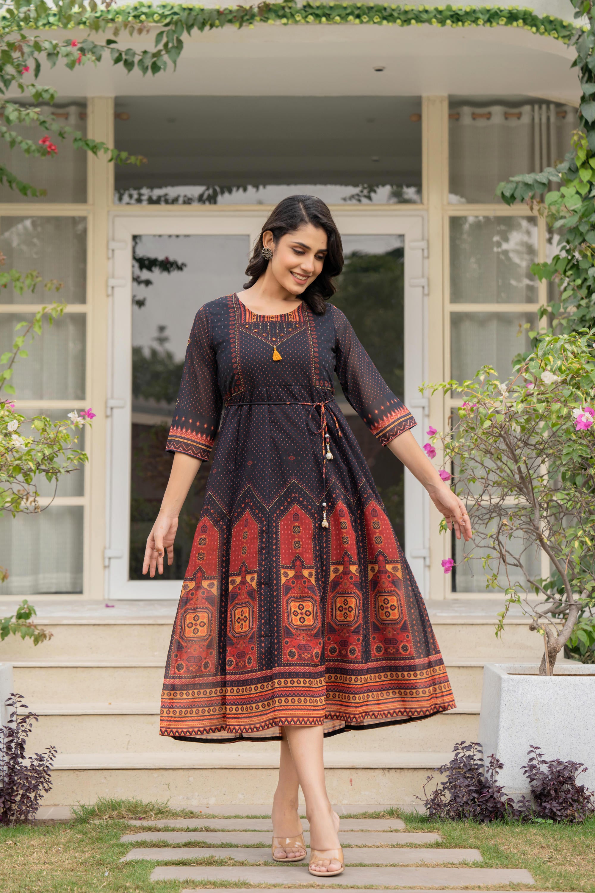 Black Ethnic Motif Printed Georgette Dress With Doris & Tassels