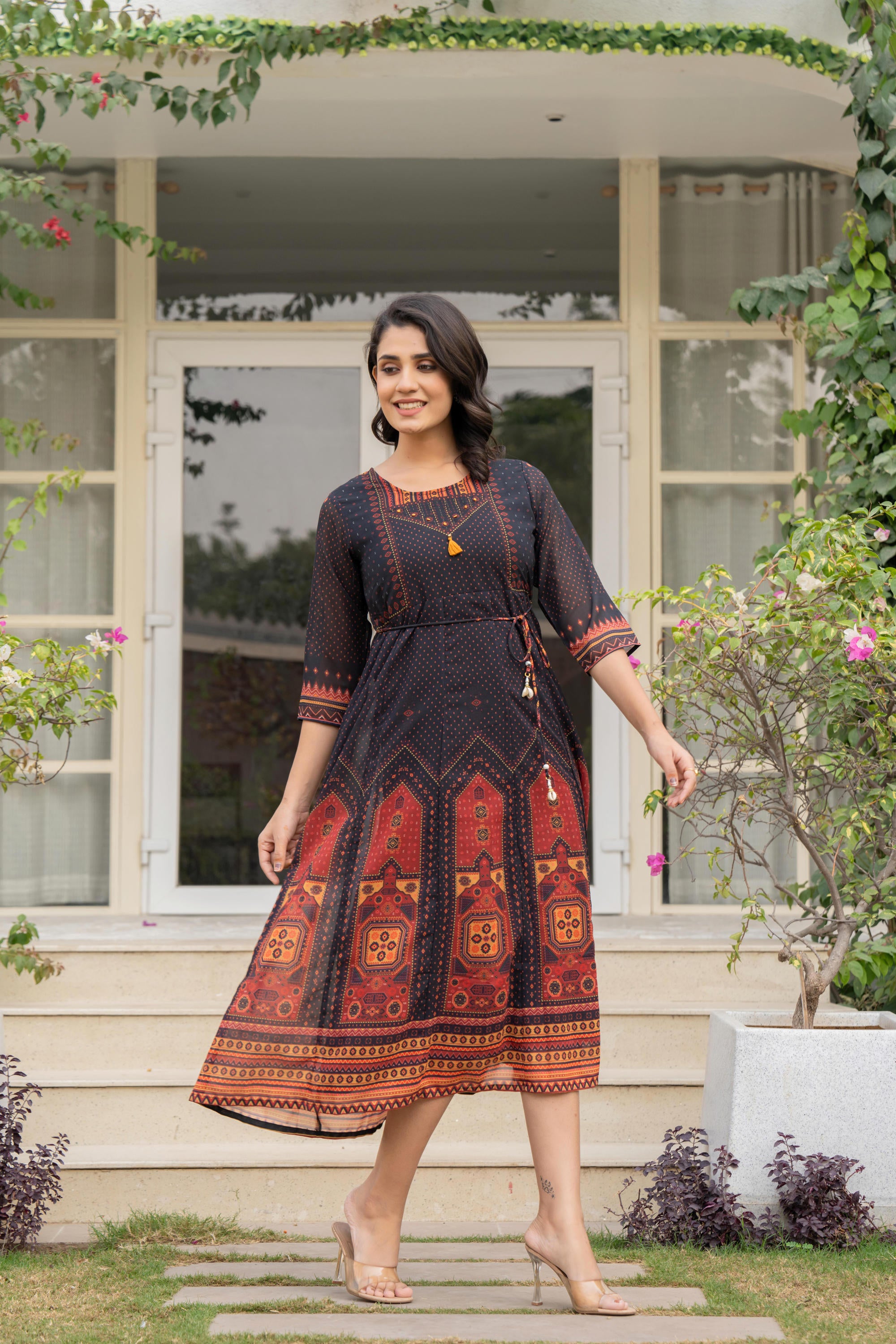 Black Ethnic Motif Printed Georgette Dress With Doris & Tassels