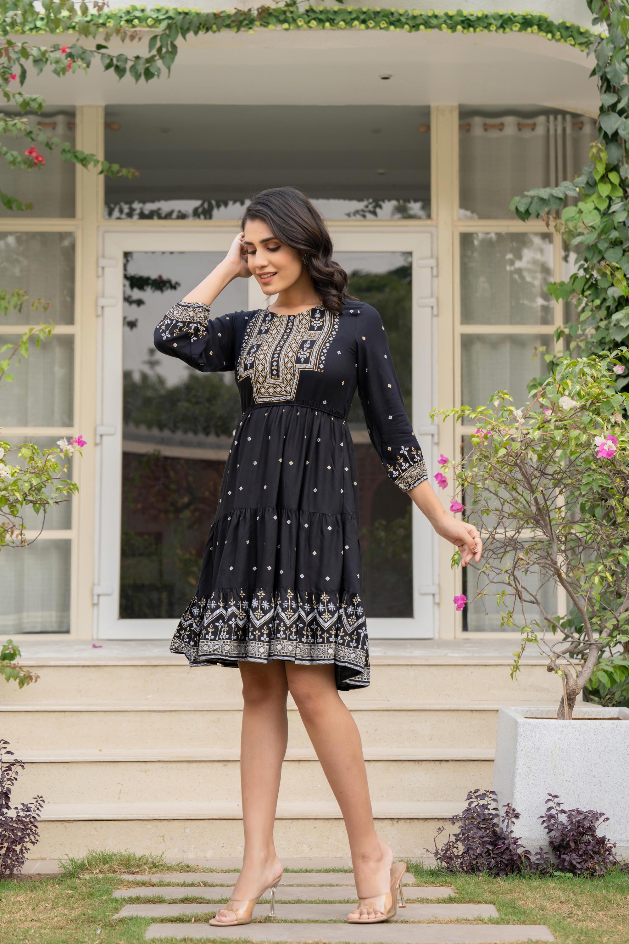 Black Ethnic Motif Printed Liva RayonDress With Doris & Tassels