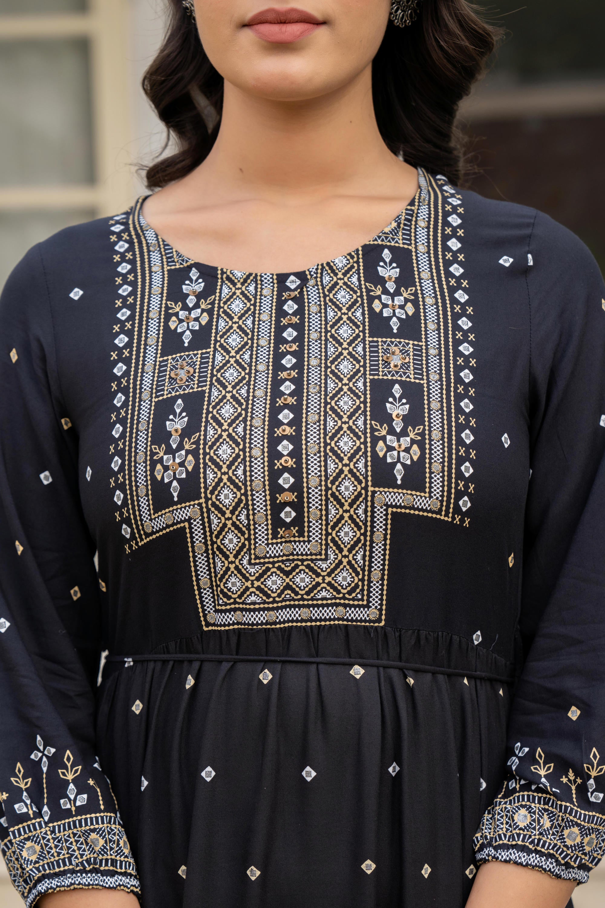 Black Ethnic Motif Printed Liva RayonDress With Doris & Tassels