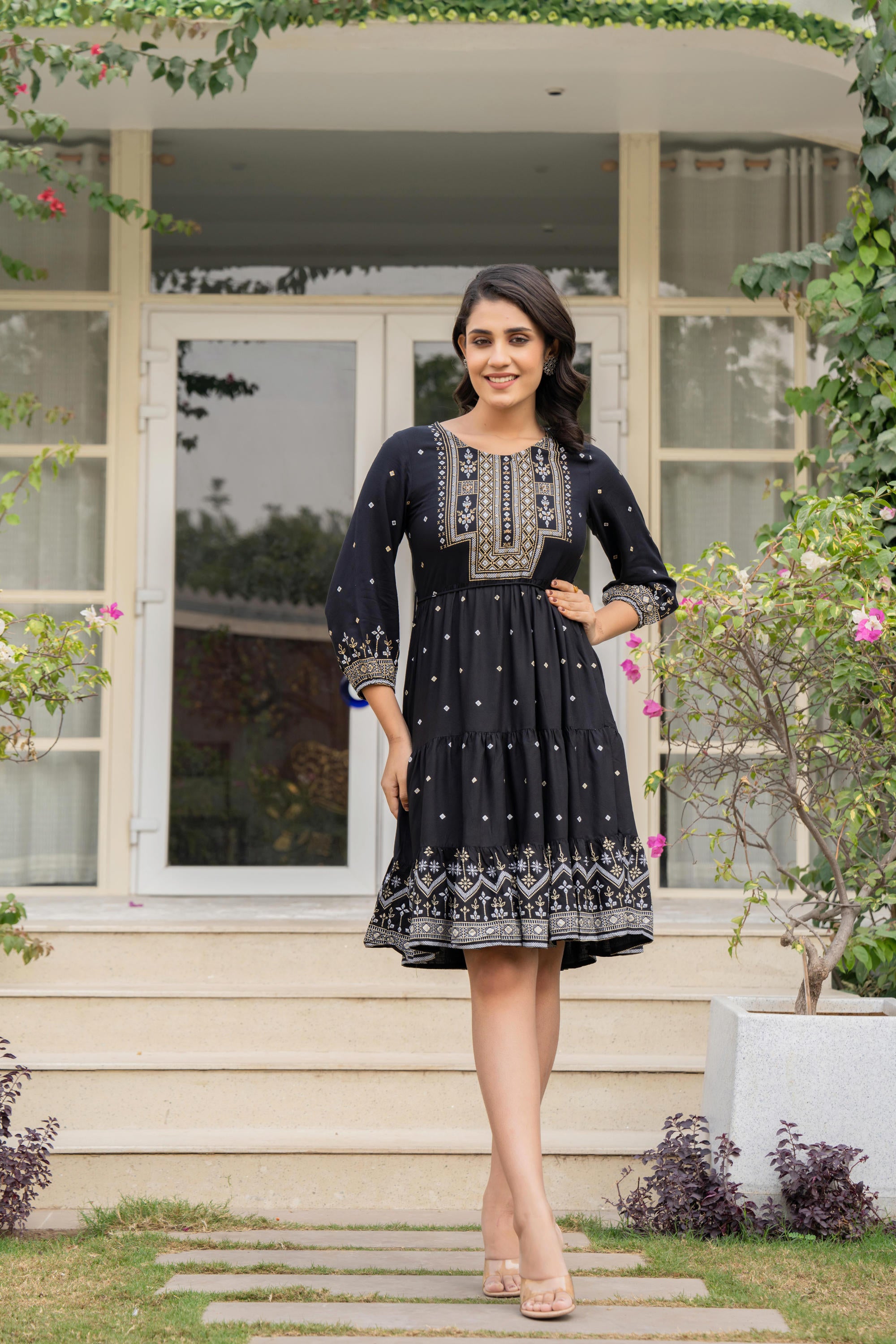 Black Ethnic Motif Printed Liva RayonDress With Doris & Tassels