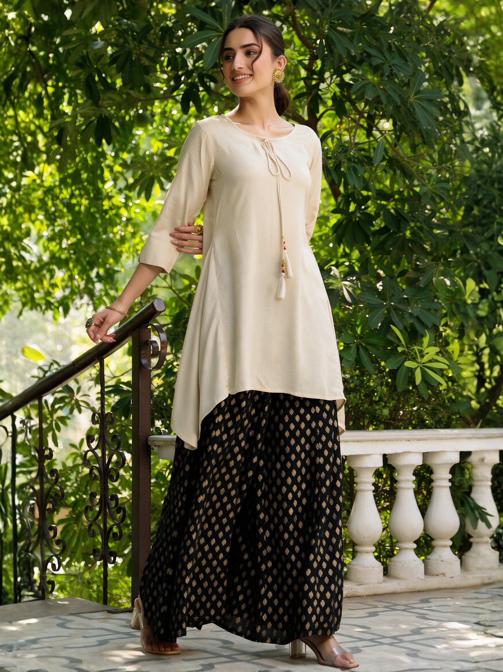 Off White Solid Rayon Slub Asymmetric Women Kurta With Tie-ups