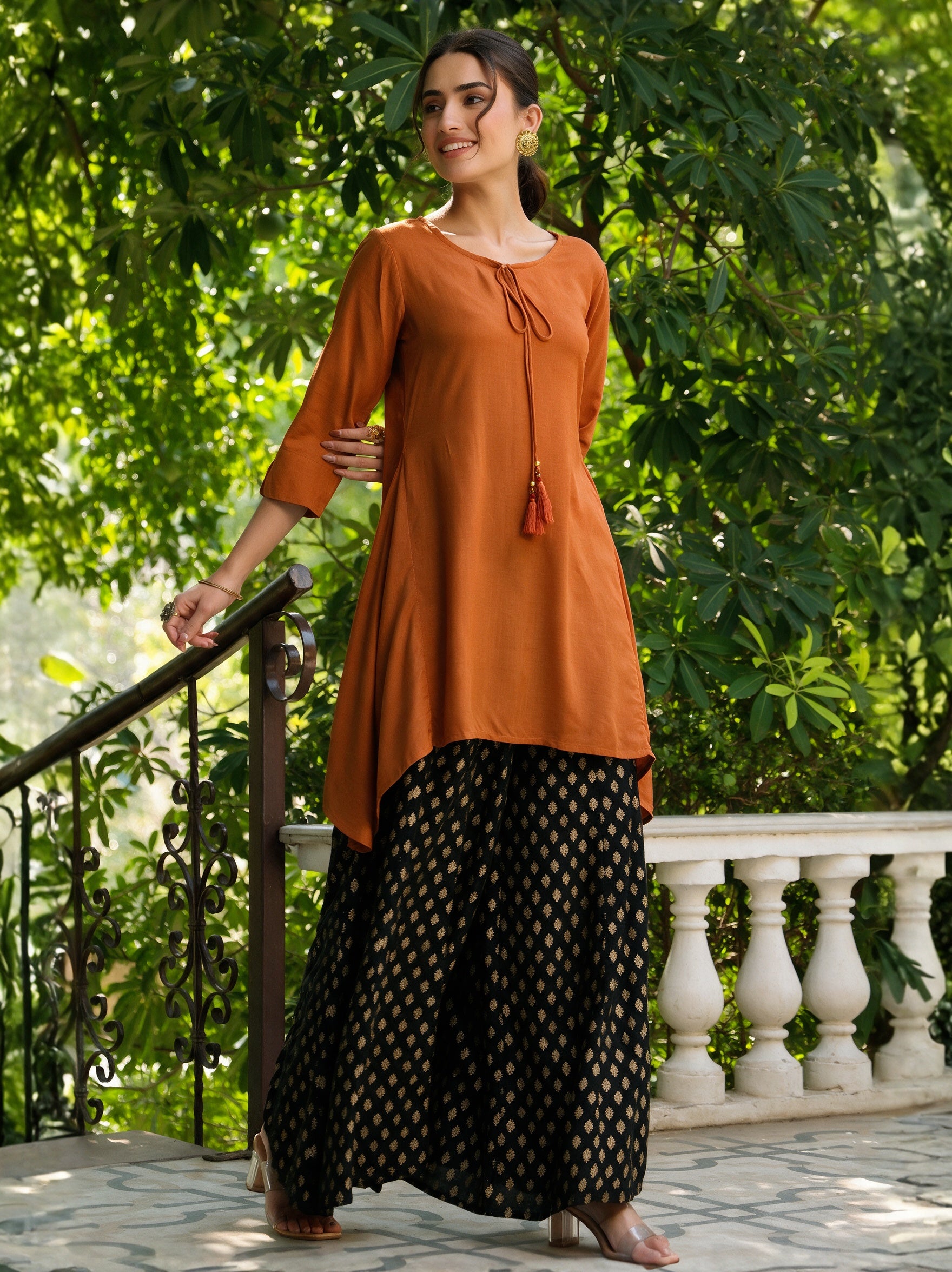 Rust Solid Rayon Slub Asymmetric Women Kurta With Tie-ups
