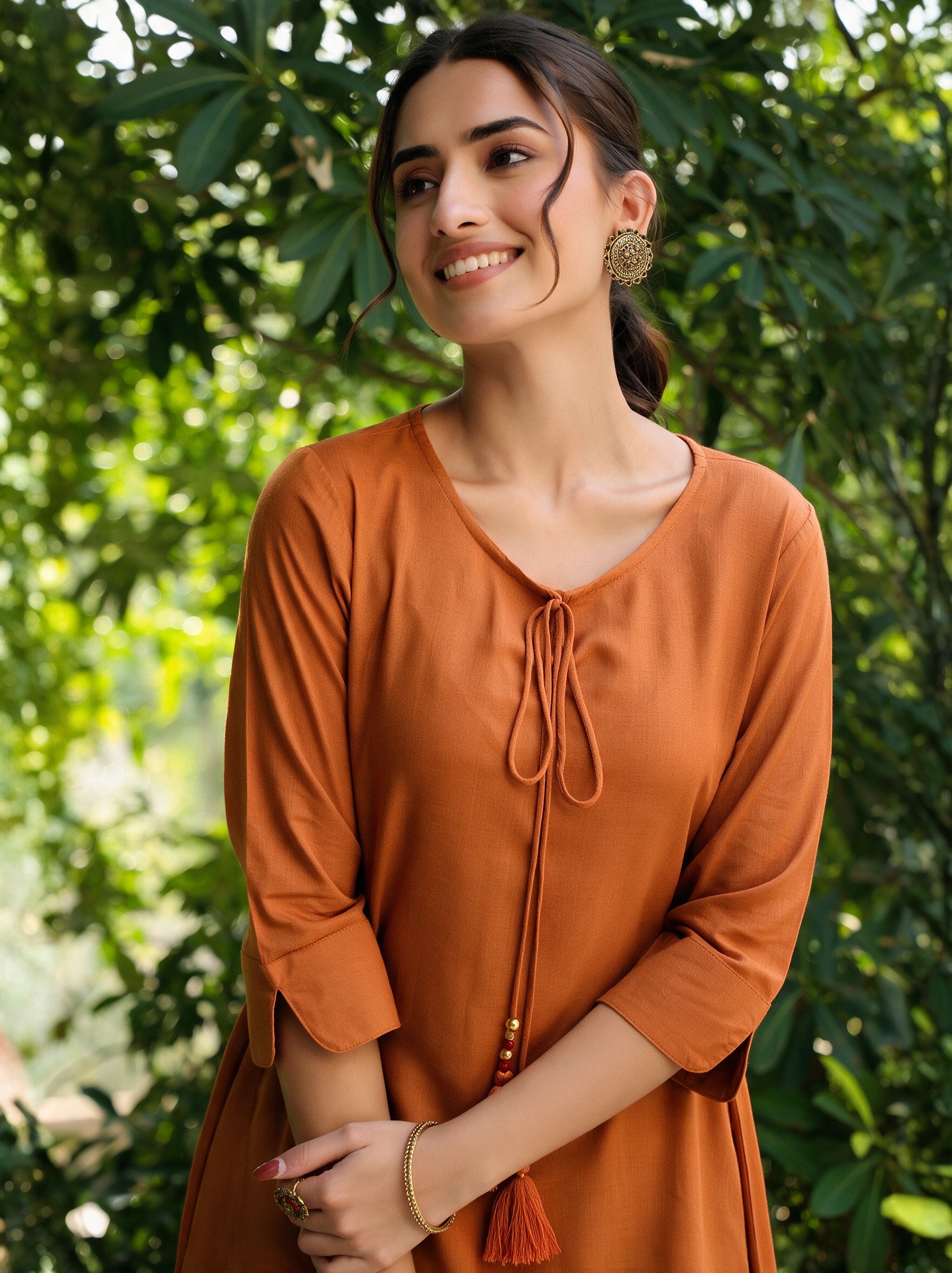 Rust Solid Rayon Slub Asymmetric Women Kurta With Tie-ups