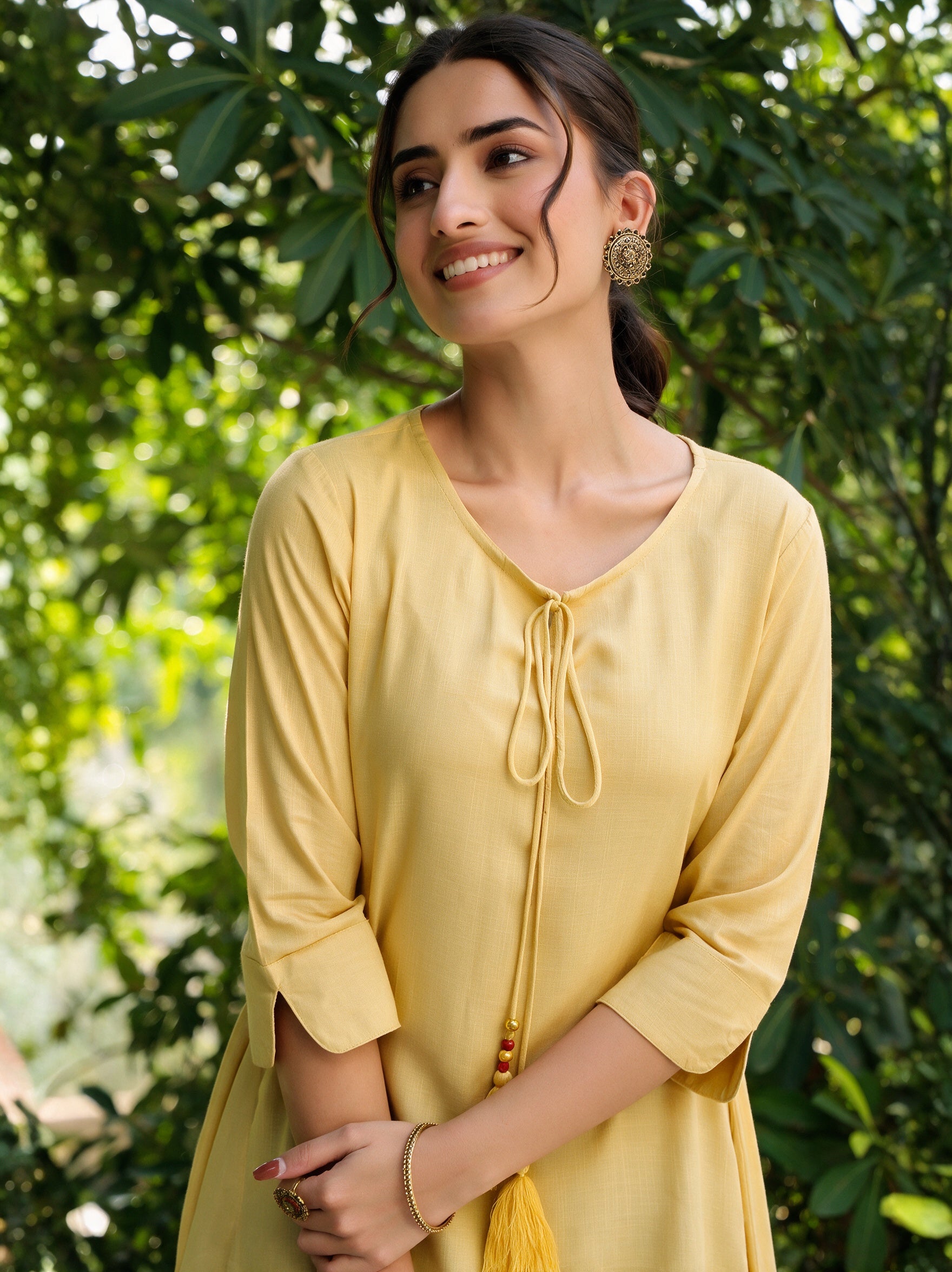 Yellow Solid Rayon Slub Asymmetric Women Kurta With Tie-ups
