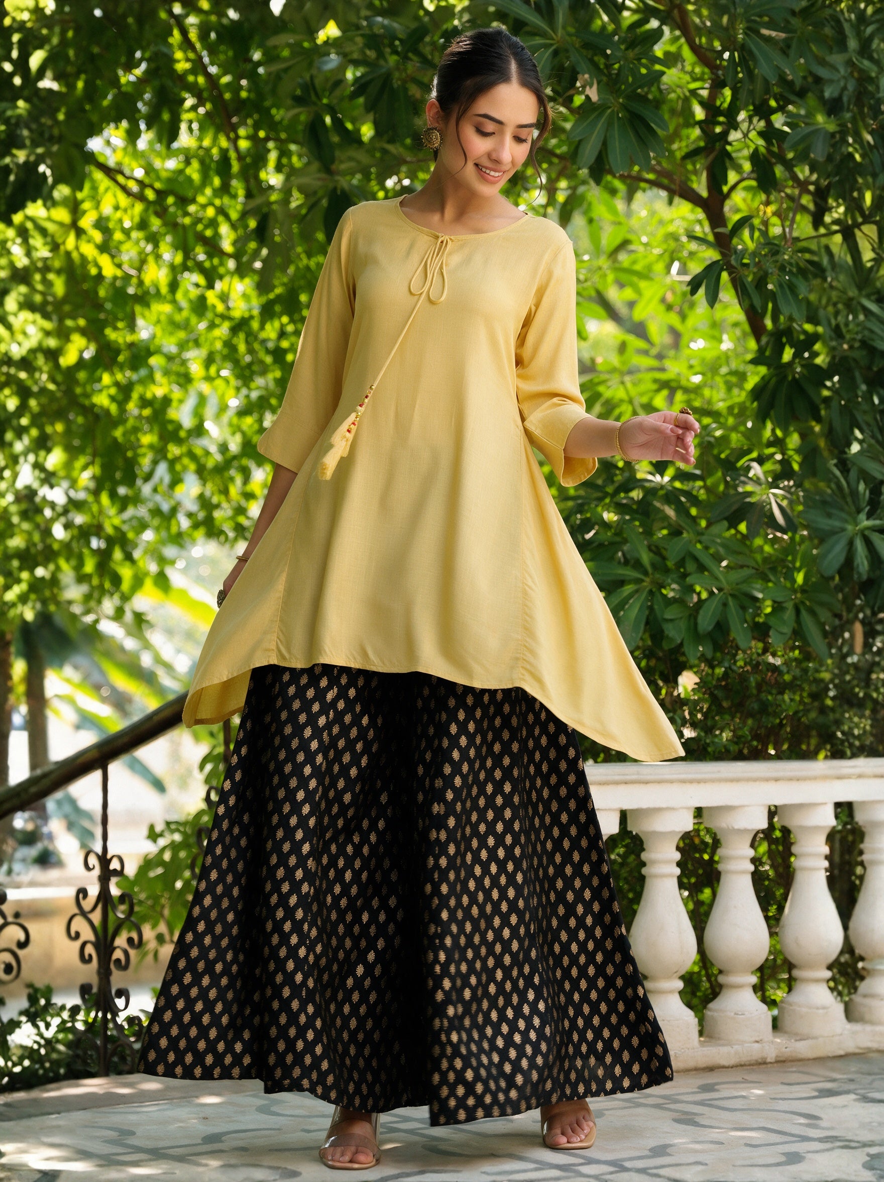 Yellow Solid Rayon Slub Asymmetric Women Kurta With Tie-ups