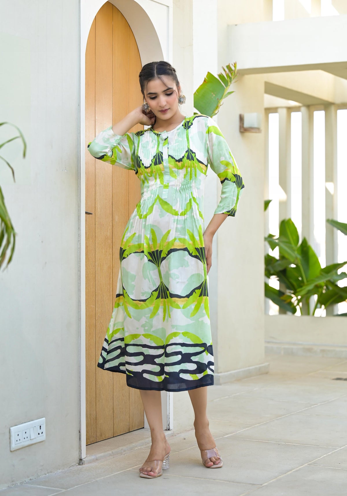 Green muslin boat neck knee length dress with ethnic print Green muslin boat neck knee length dress with ethnic print