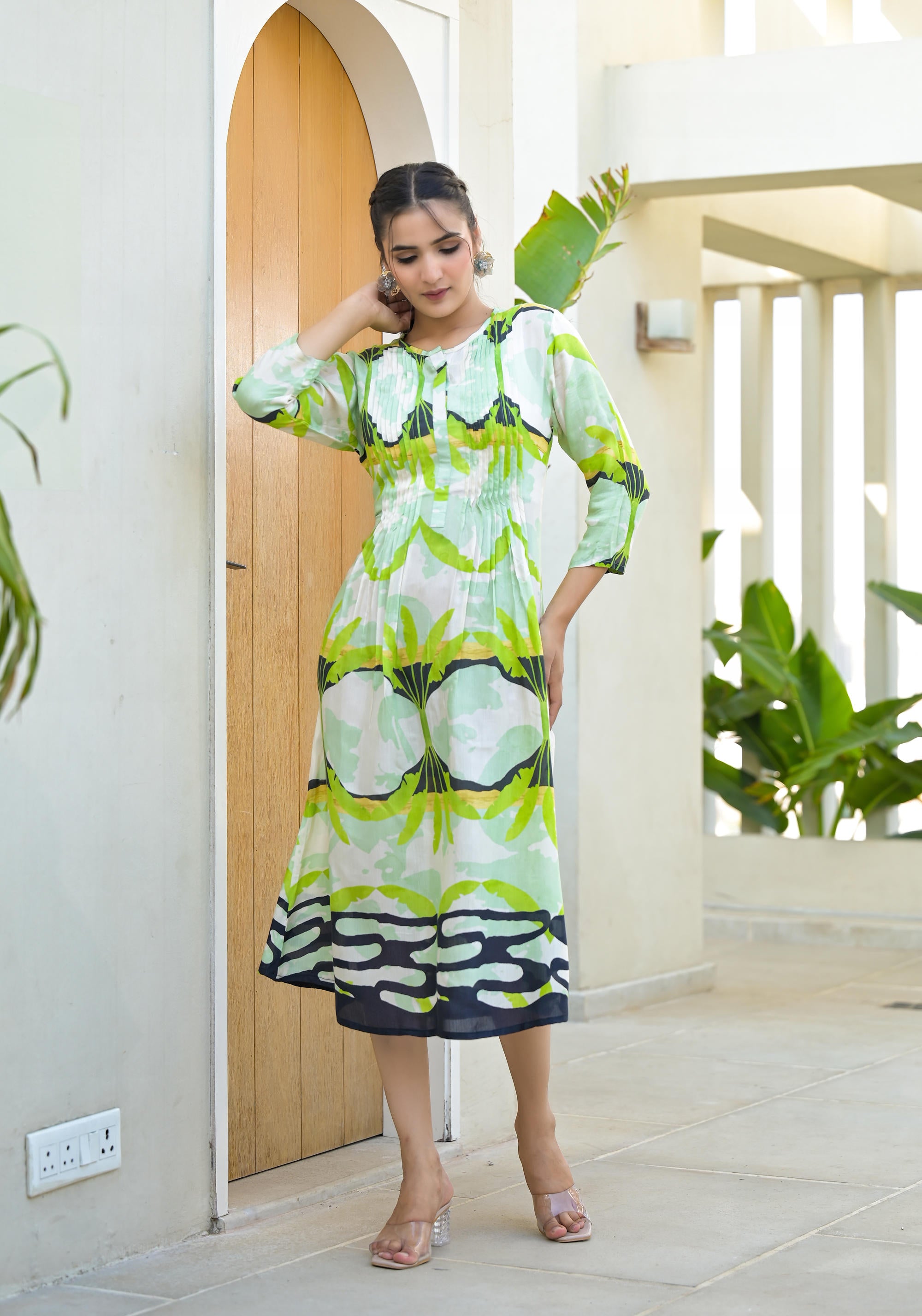 Green muslin boat neck knee length dress with ethnic print