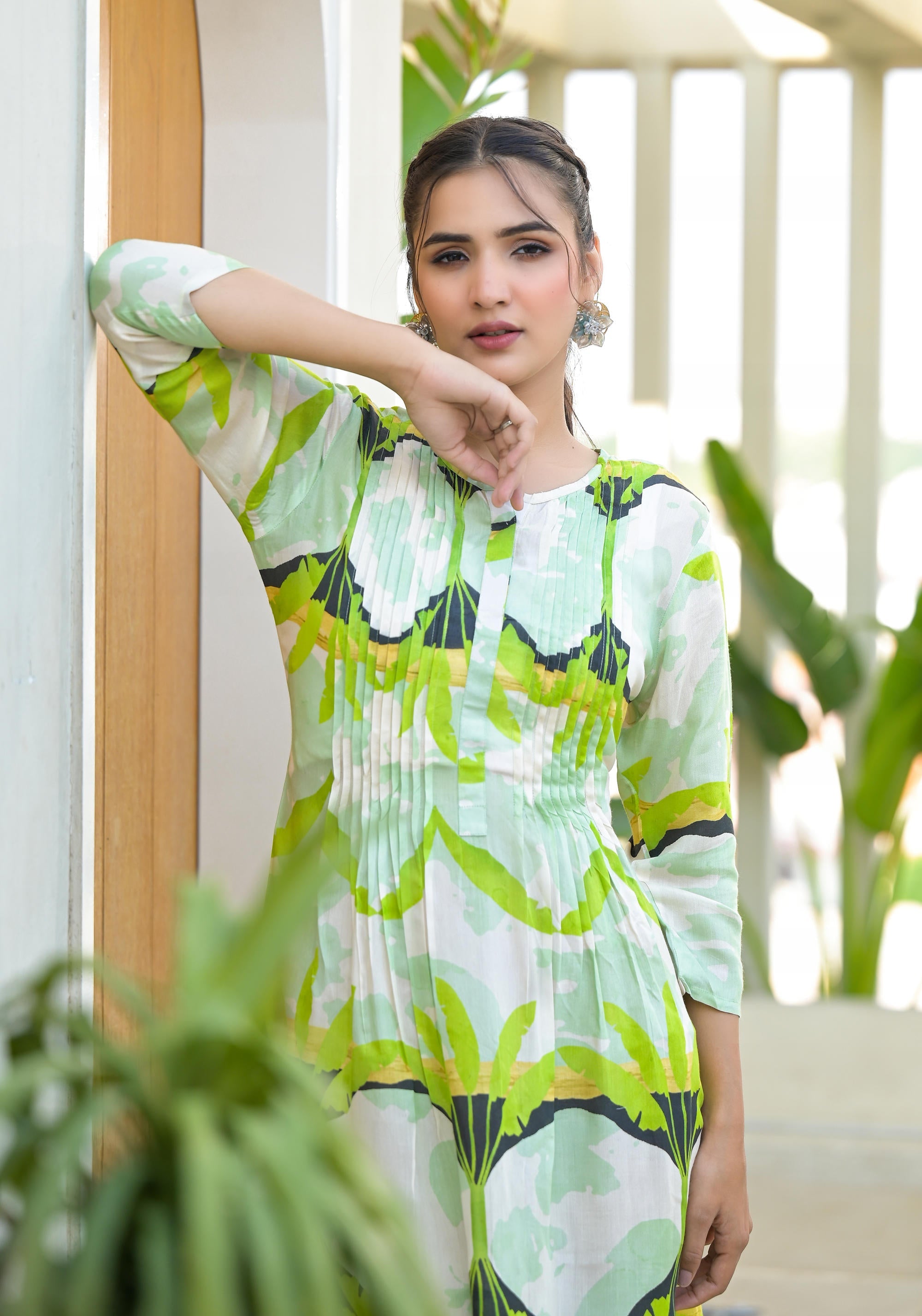 Green muslin boat neck knee length dress with ethnic print Green muslin boat neck knee length dress with ethnic print