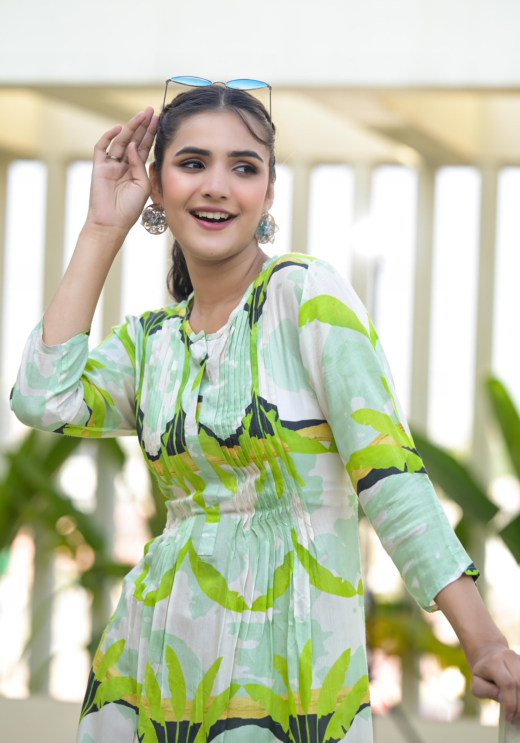 Green muslin boat neck knee length dress with ethnic print Green muslin boat neck knee length dress with ethnic print