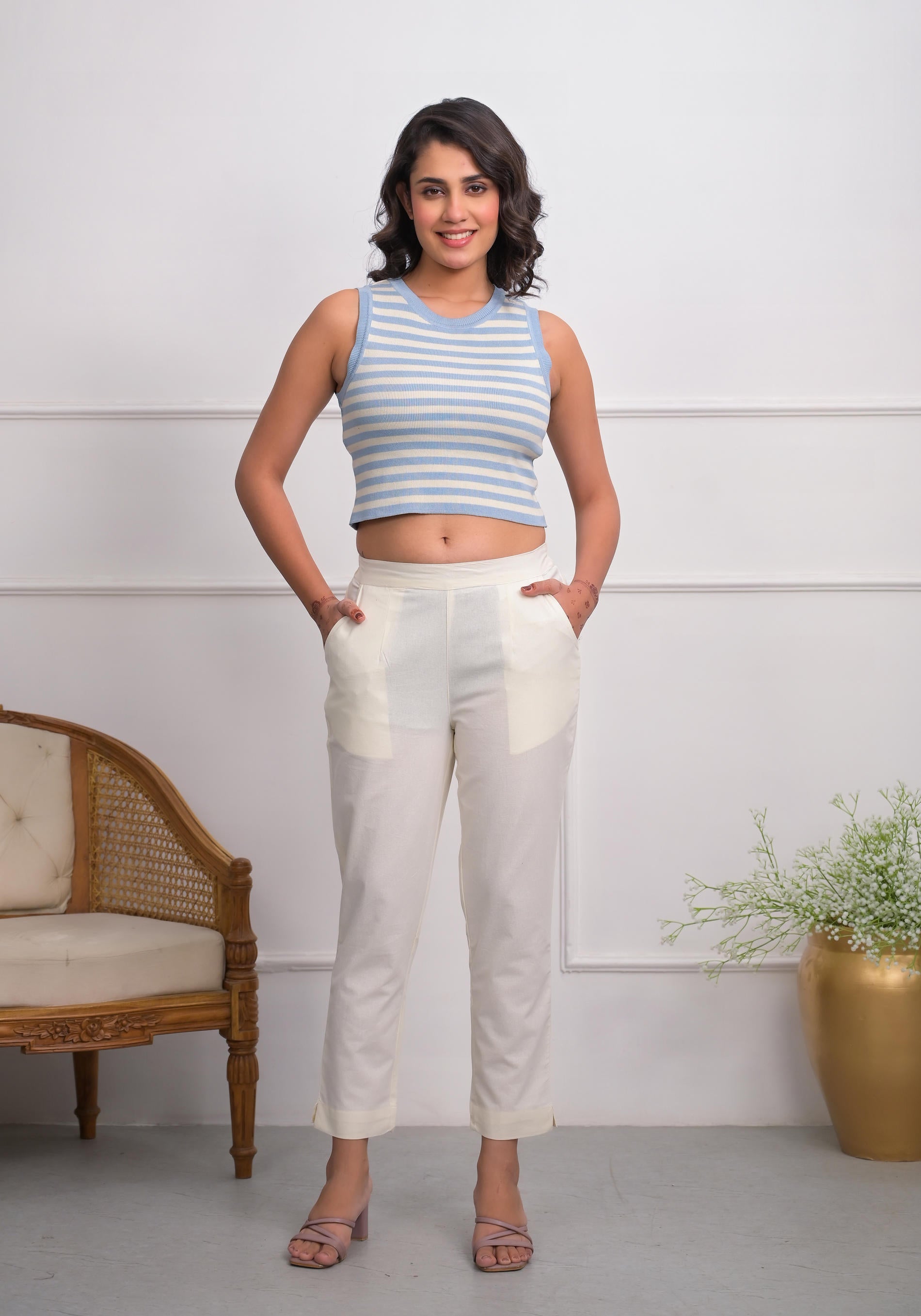 Off White Solid Cotton Pants With Partially Elasticated Waistband And Two Side Pockets