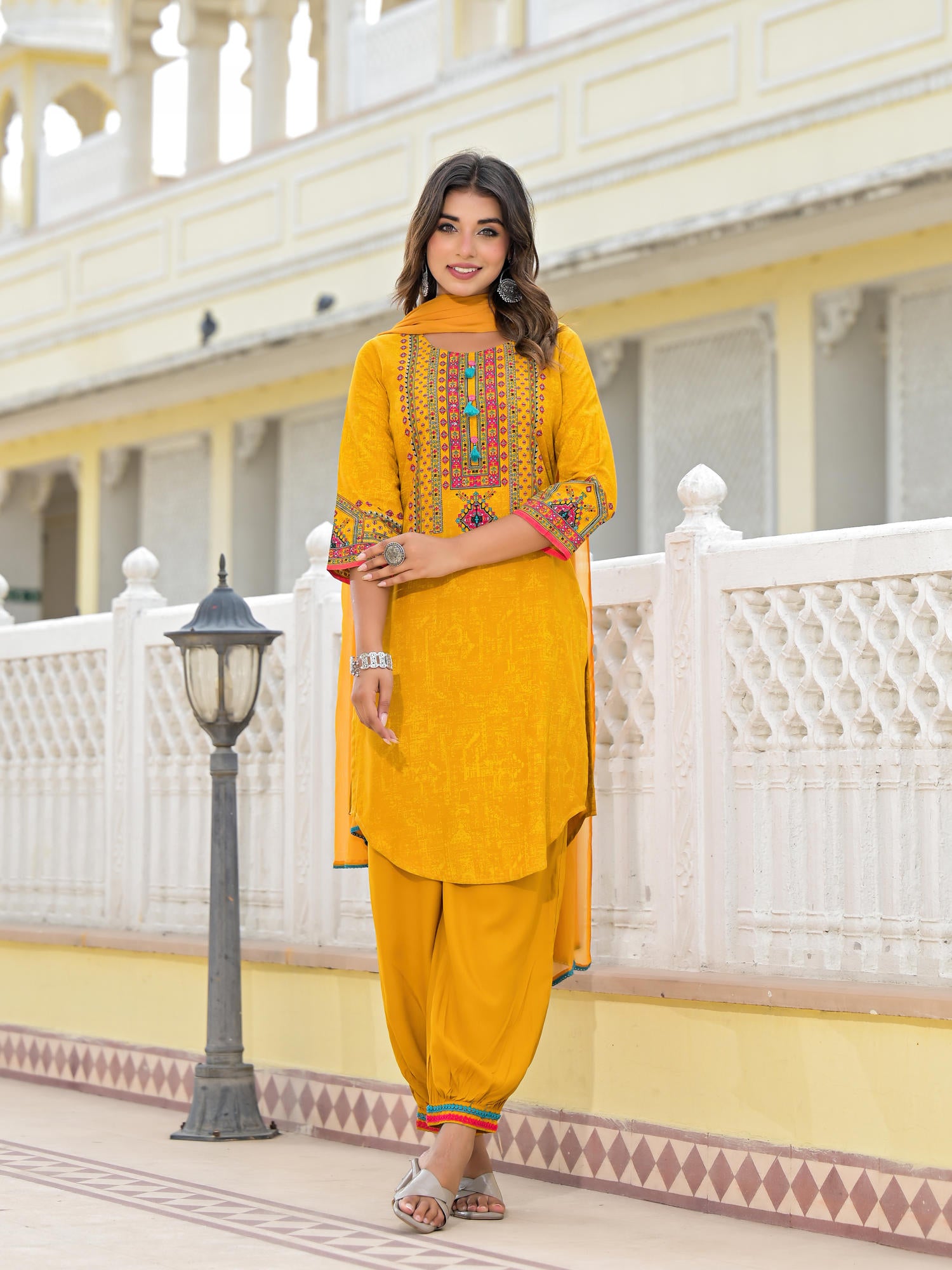 Juniper Mustard Ethnic Motif Printed Kurta, Pant And Dupatta Set With Tassels & Buttons.