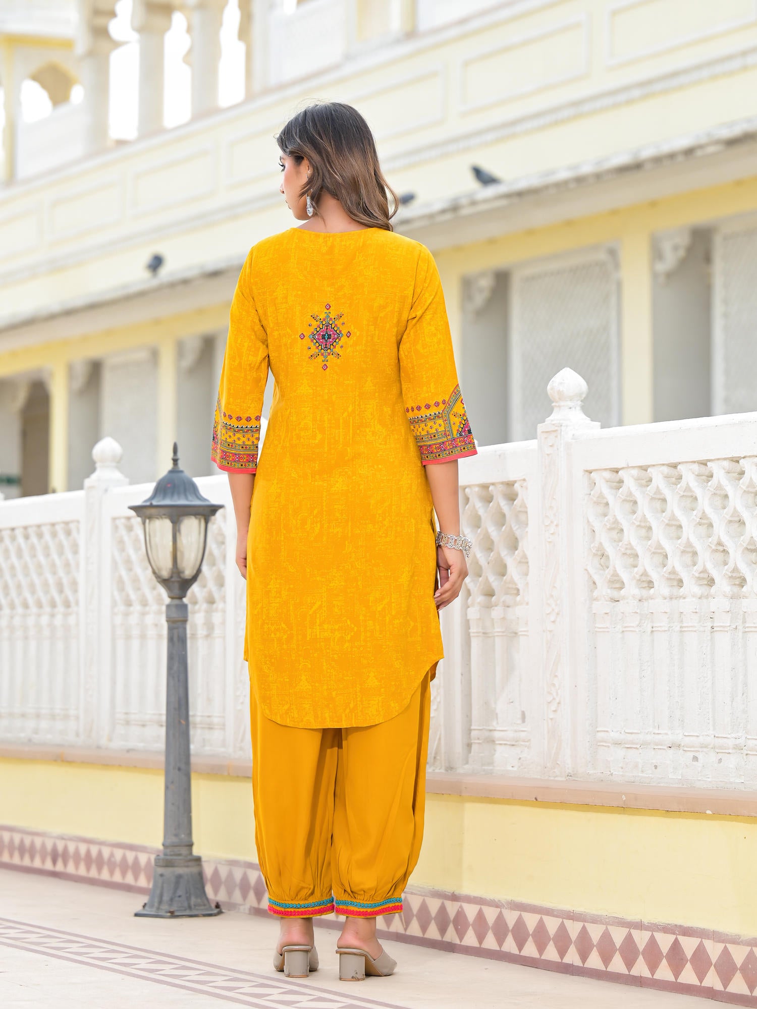 Juniper Mustard Ethnic Motif Printed Kurta, Pant And Dupatta Set With Tassels & Buttons.