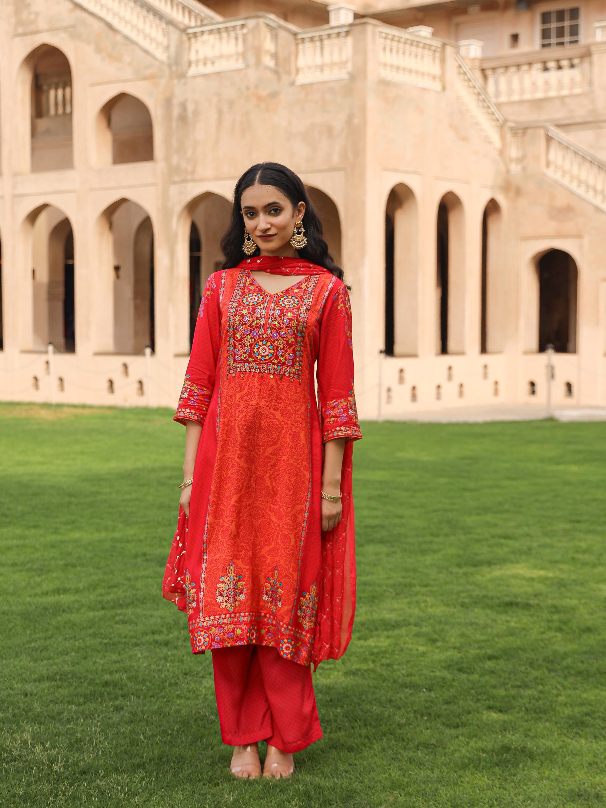 The Dholitaro Orange Floral Printed Viscose Kurta Pant And Dupatta With Thread& Sequins Work And Coins